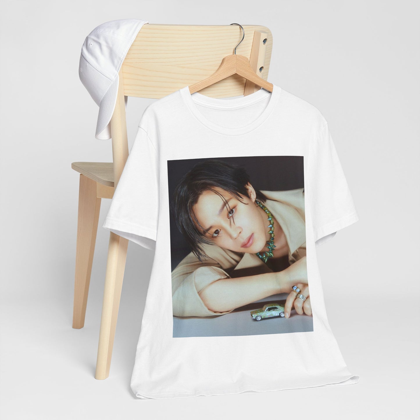 A black graphic t-shirt featuring a retro graphic related to Jimin's 'Filter' era.