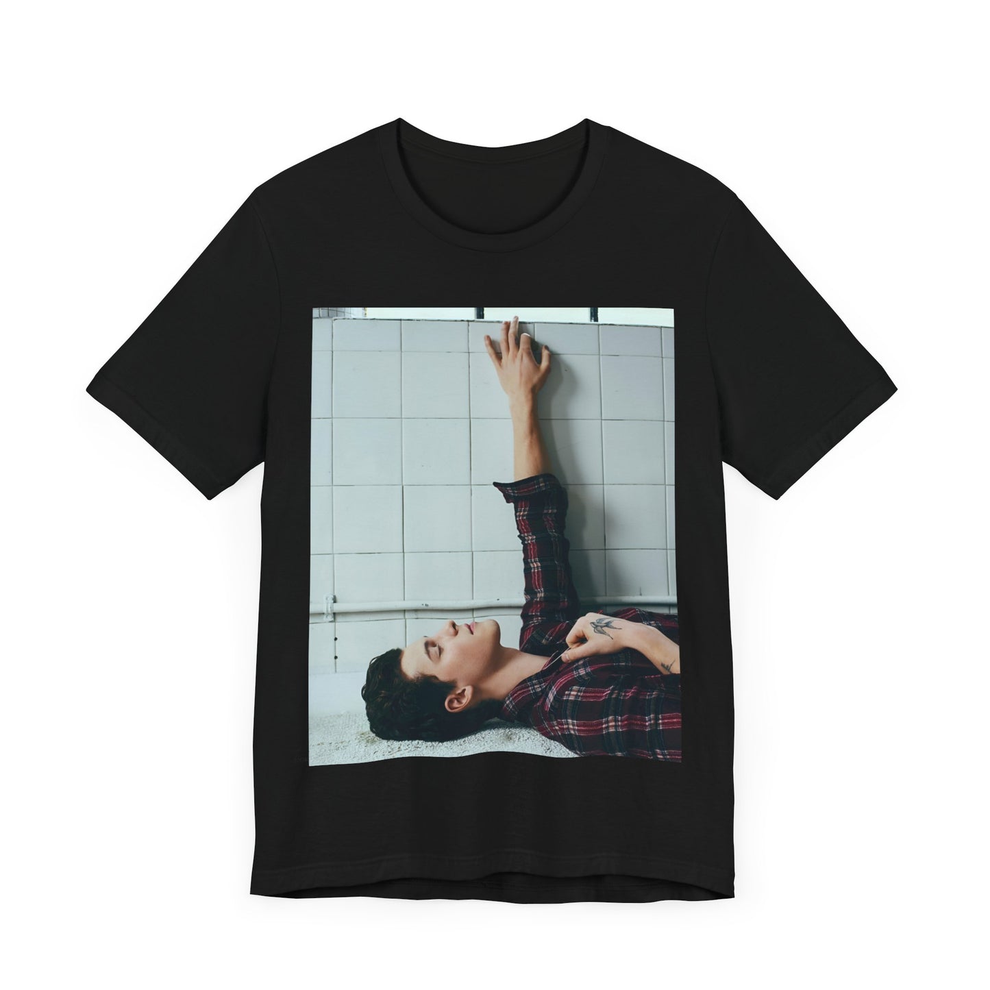 A black graphic t-shirt featuring a bold graphic of Shawn Mendes as a superstar.