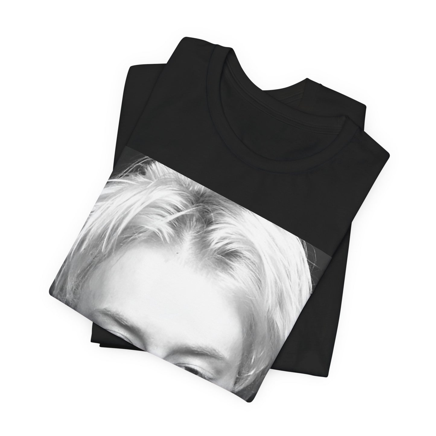 A black graphic t-shirt featuring a 90s black and white portrait photo of Thom Yorke from Radiohead.