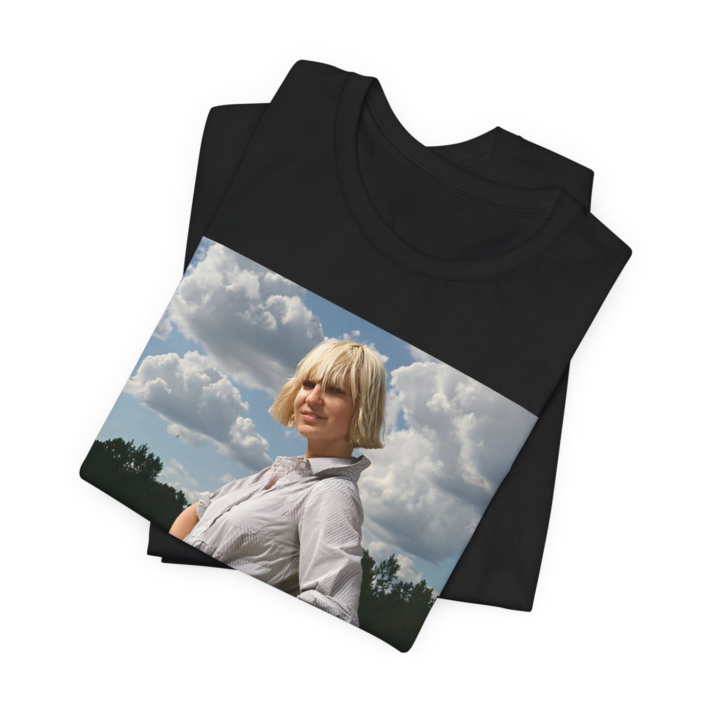 A black graphic t-shirt featuring a bold graphic of Sia as a pop superstar.