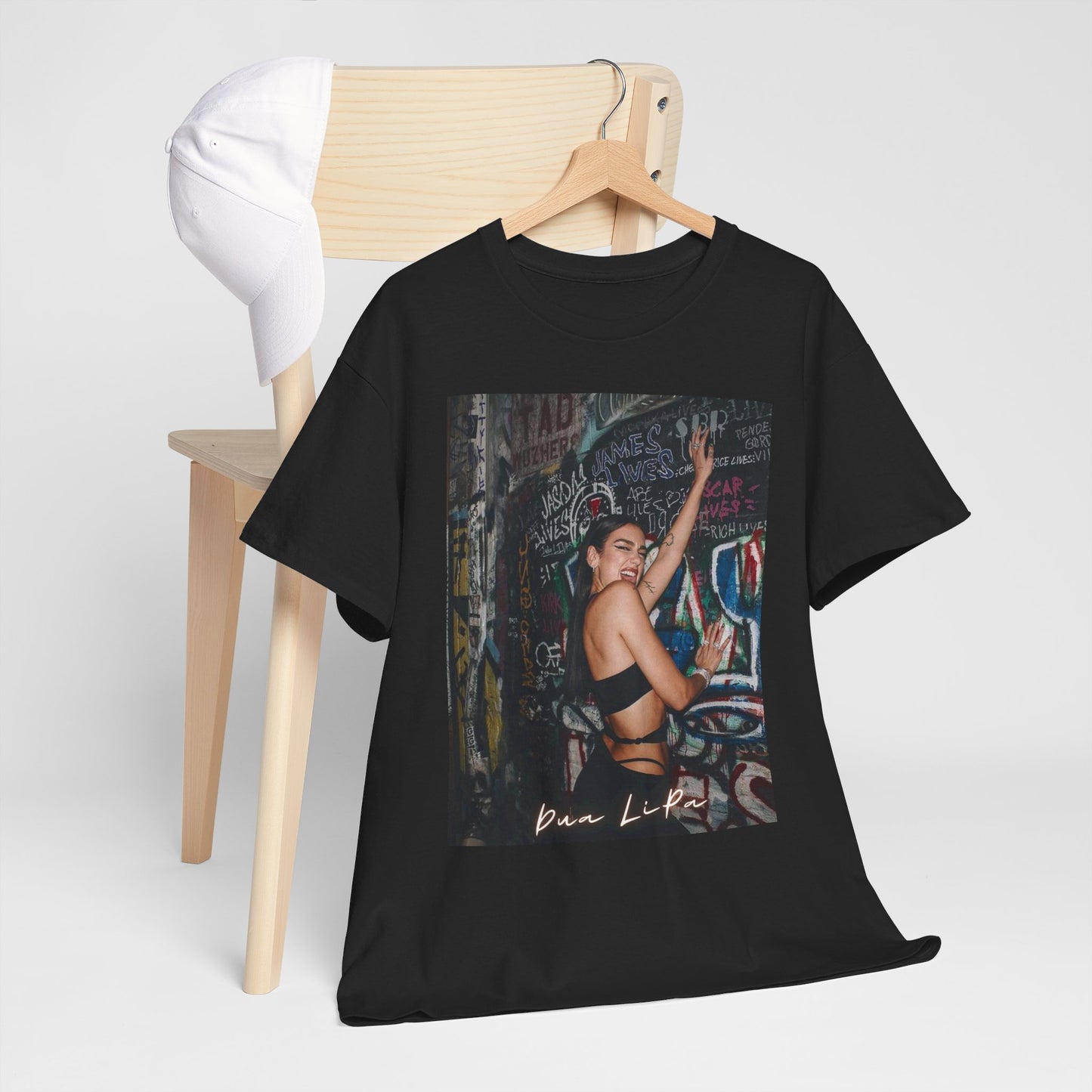 A black graphic t-shirt featuring a retro graphic inspired by Dua Lipa's "Future Nostalgia" album.