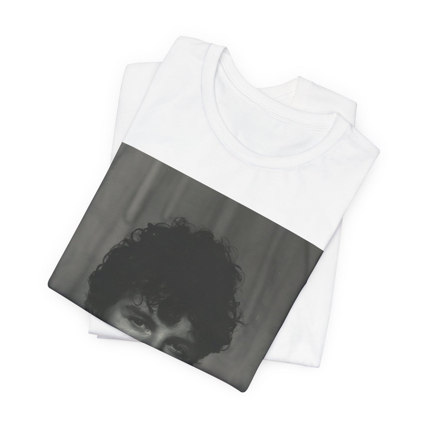A black graphic t-shirt featuring a fearless portrait graphic of Shawn Mendes.