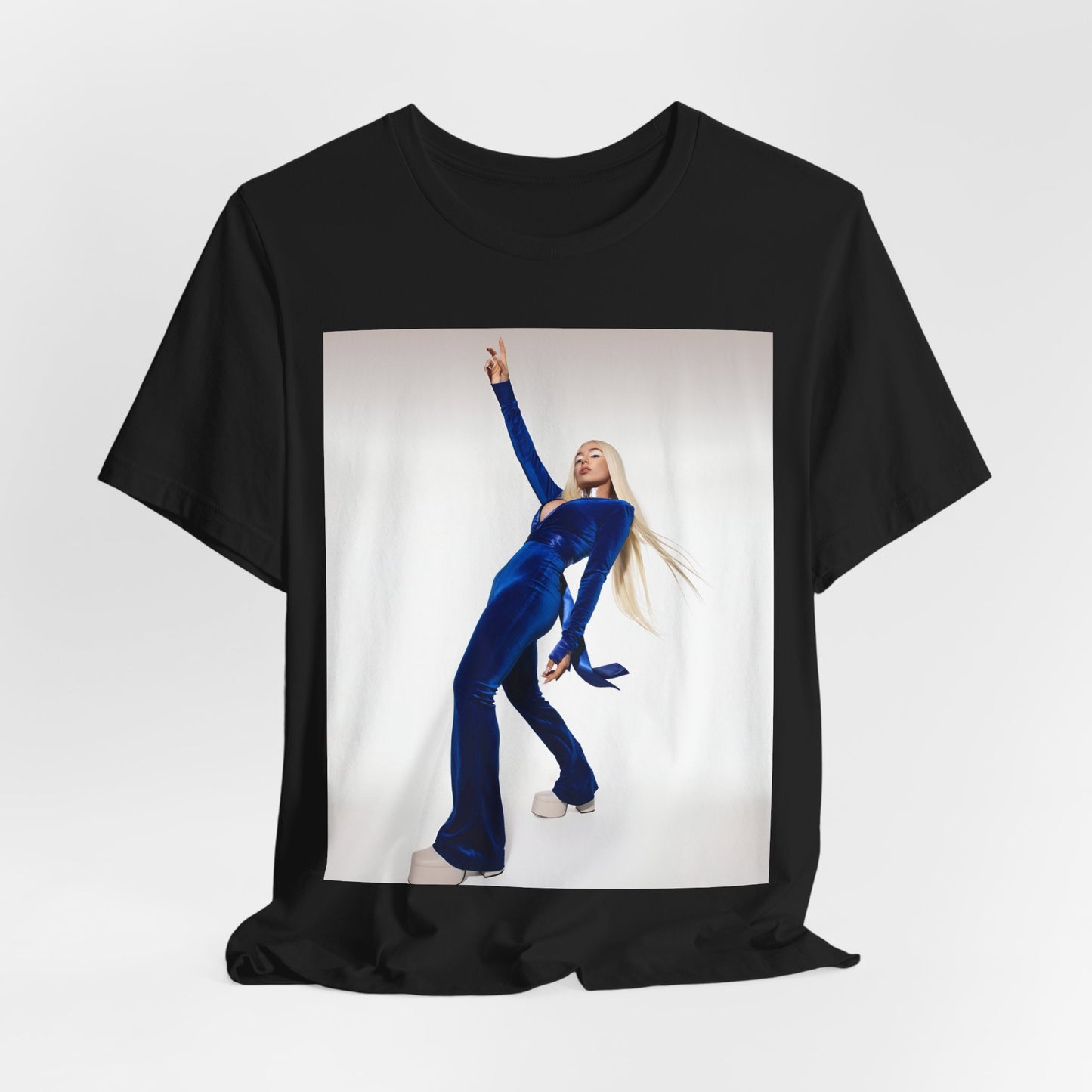 A black graphic t-shirt featuring Ava Max in a blue jumpsuit, in a graphic or photo style.