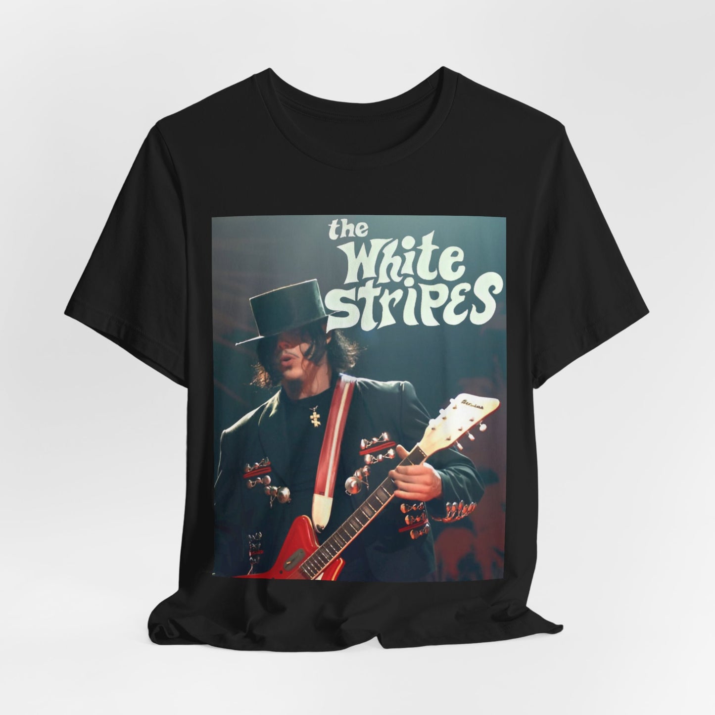 A black graphic t-shirt featuring a graphic of Jack White from The White Stripes as a guitar god.