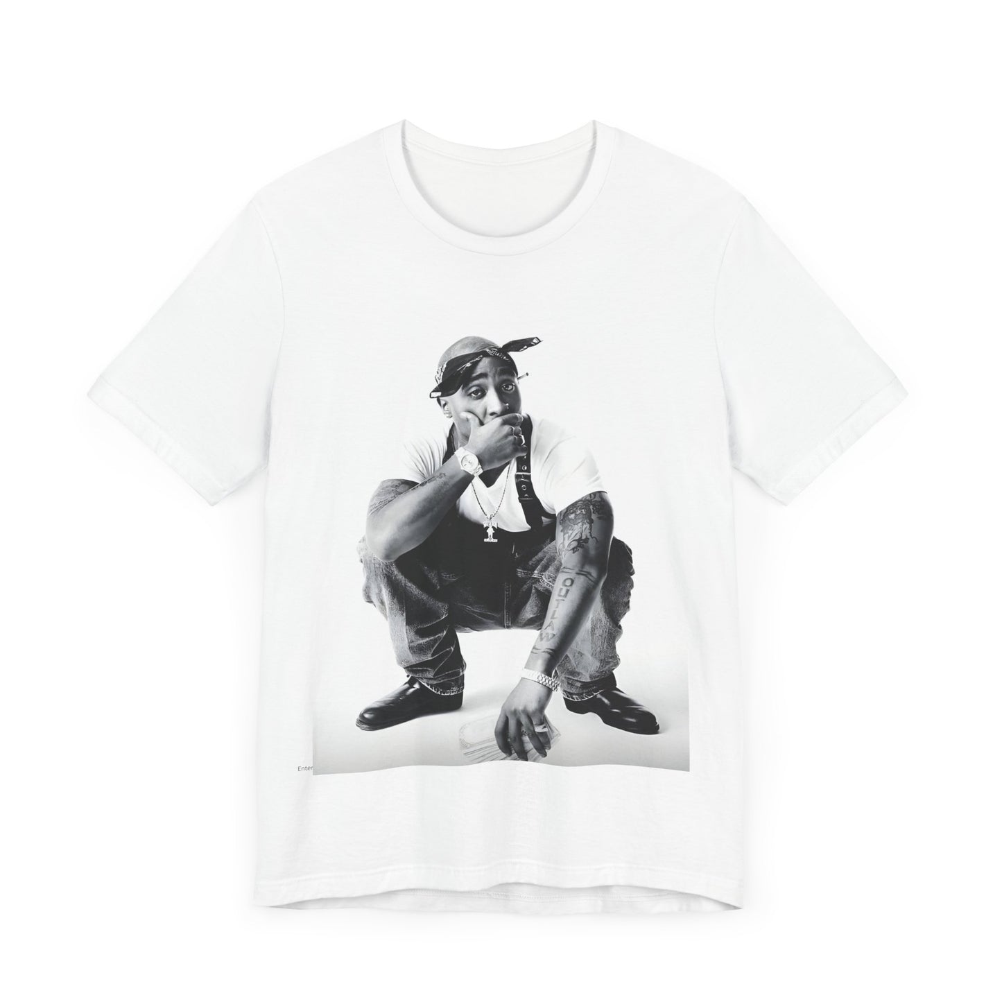 A black graphic t-shirt featuring a graphic of Tupac with a conscious rap vibe.
