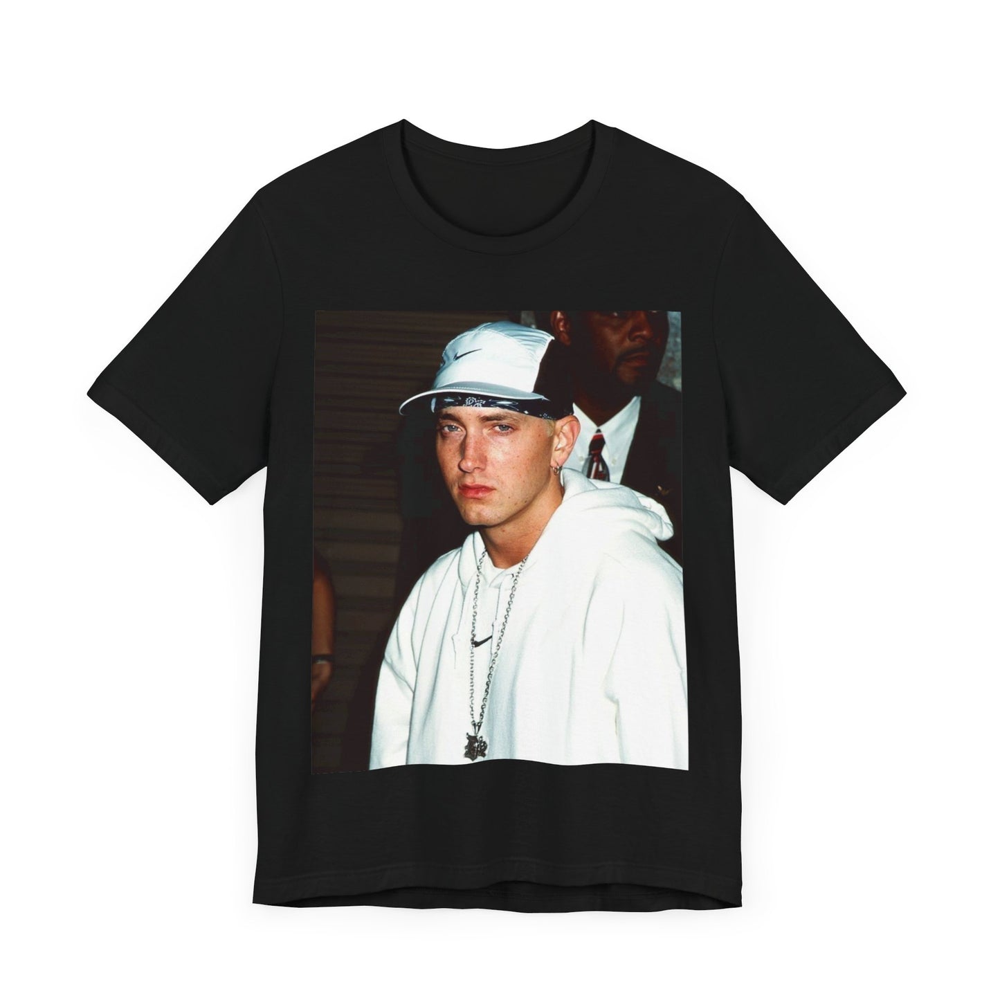 A black graphic t-shirt featuring a retro graphic or photo of Eminem in a backstage setting.