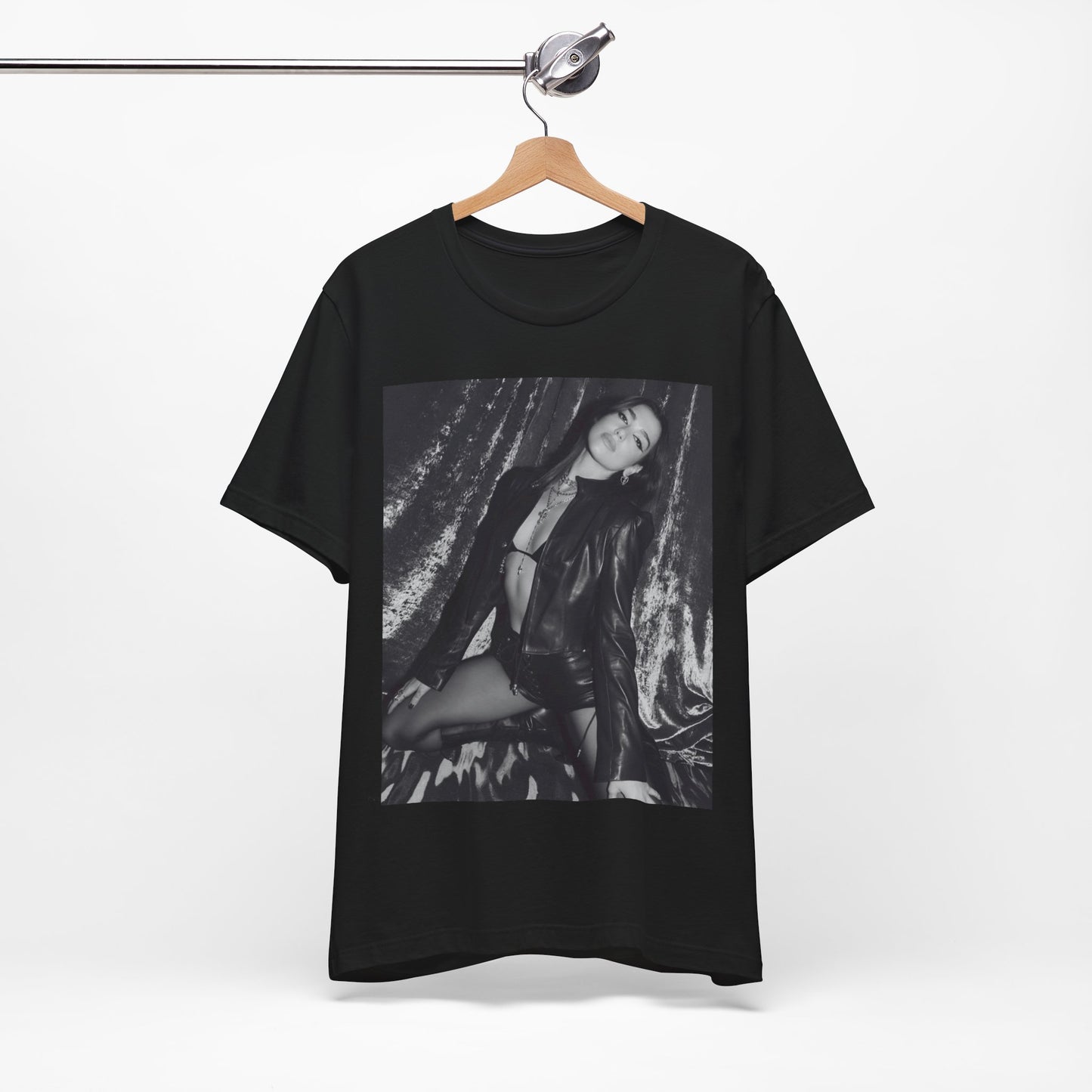 A black graphic t-shirt featuring a black and white portrait photo of Dua Lipa.