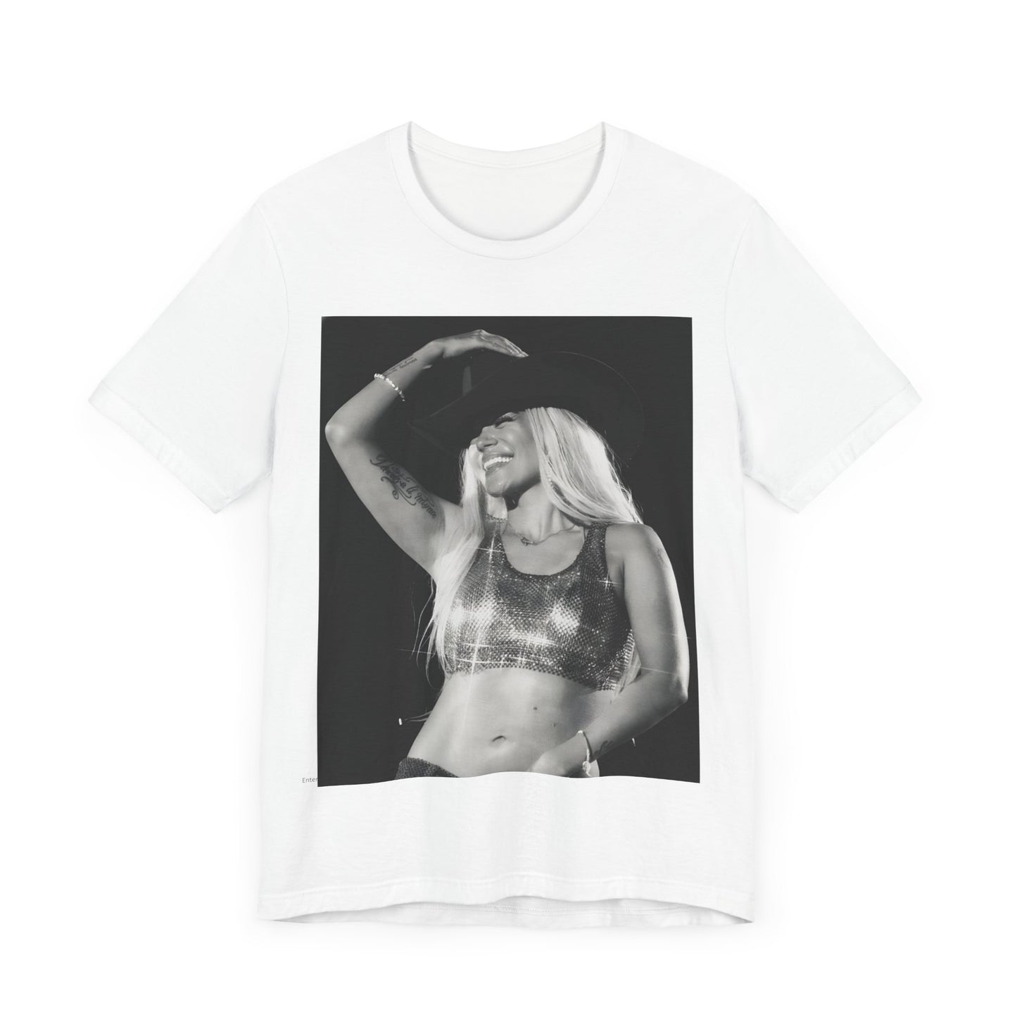 A black graphic t-shirt featuring a black and white graphic or photo of Karol G performing live on stage.