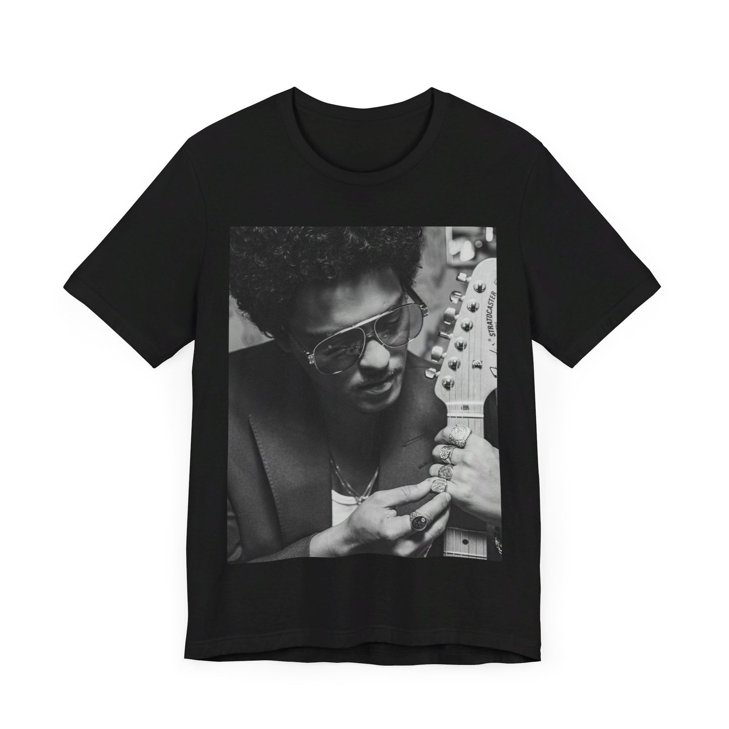 A black graphic t-shirt featuring a graphic of Bruno Mars in a classic crooner style.