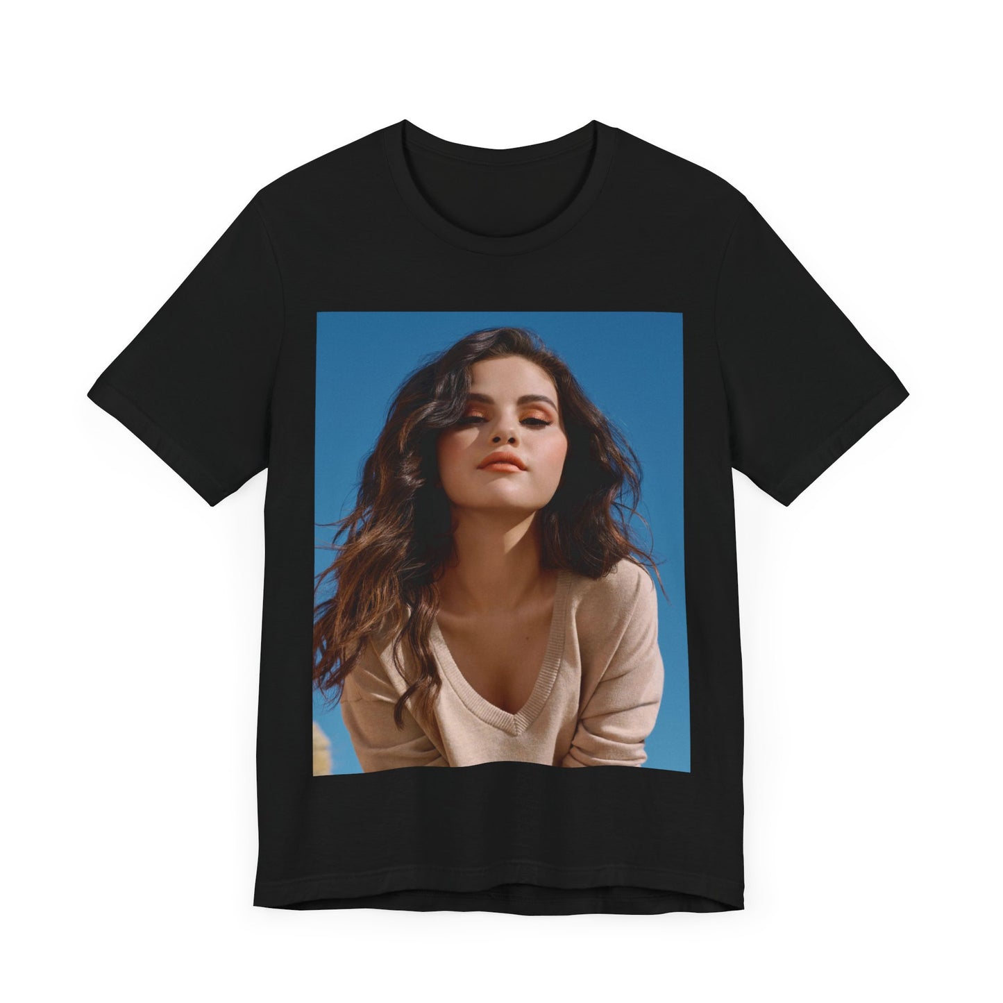 A black graphic t-shirt featuring a vintage pop icon graphic of Selena Gomez.