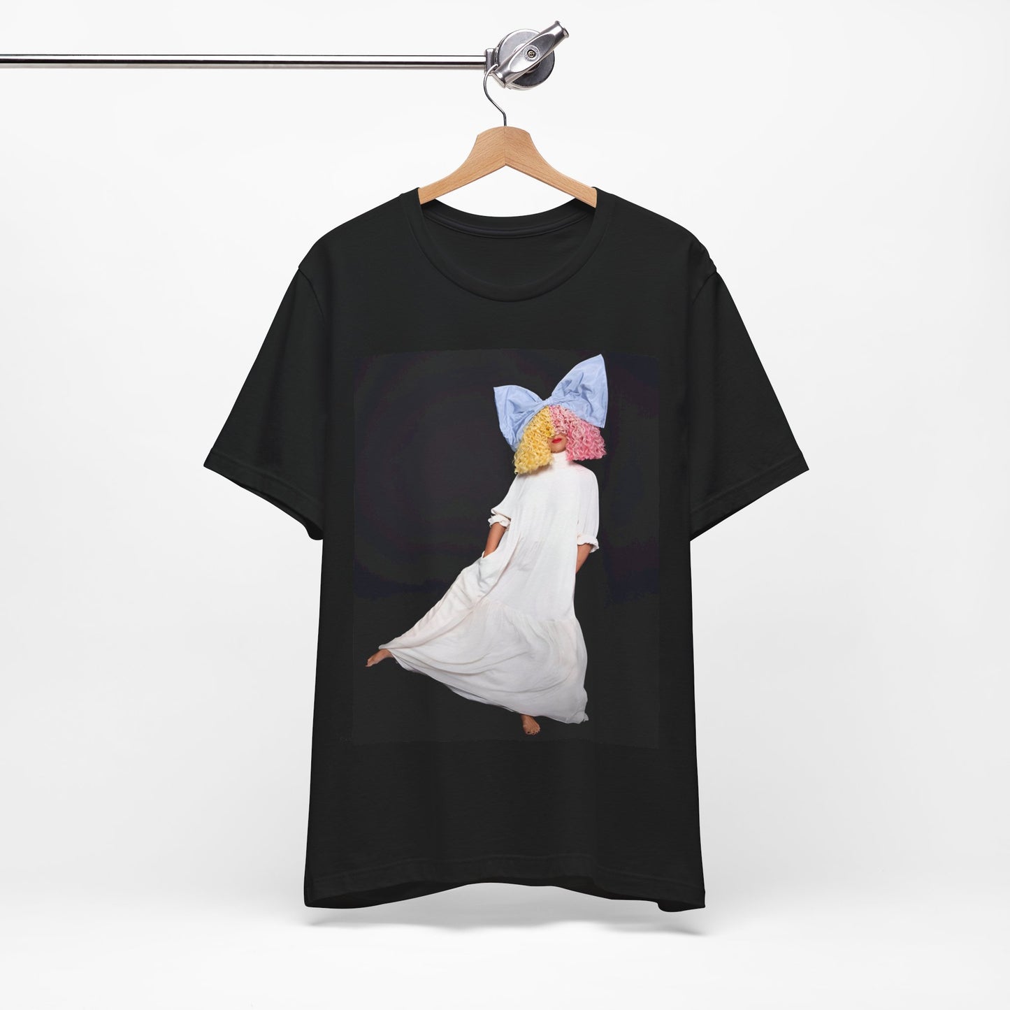 A black graphic t-shirt featuring a vintage pop icon graphic of Sia.