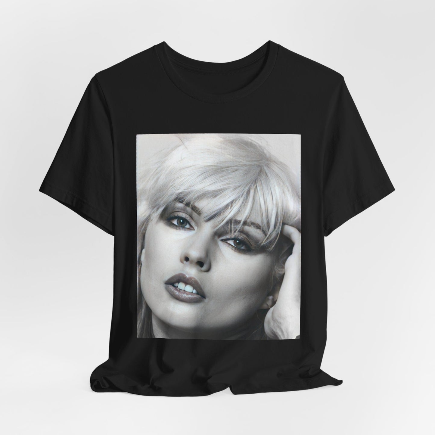A black graphic t-shirt featuring an iconic black and white portrait photo of Debbie Harry from Blondie.