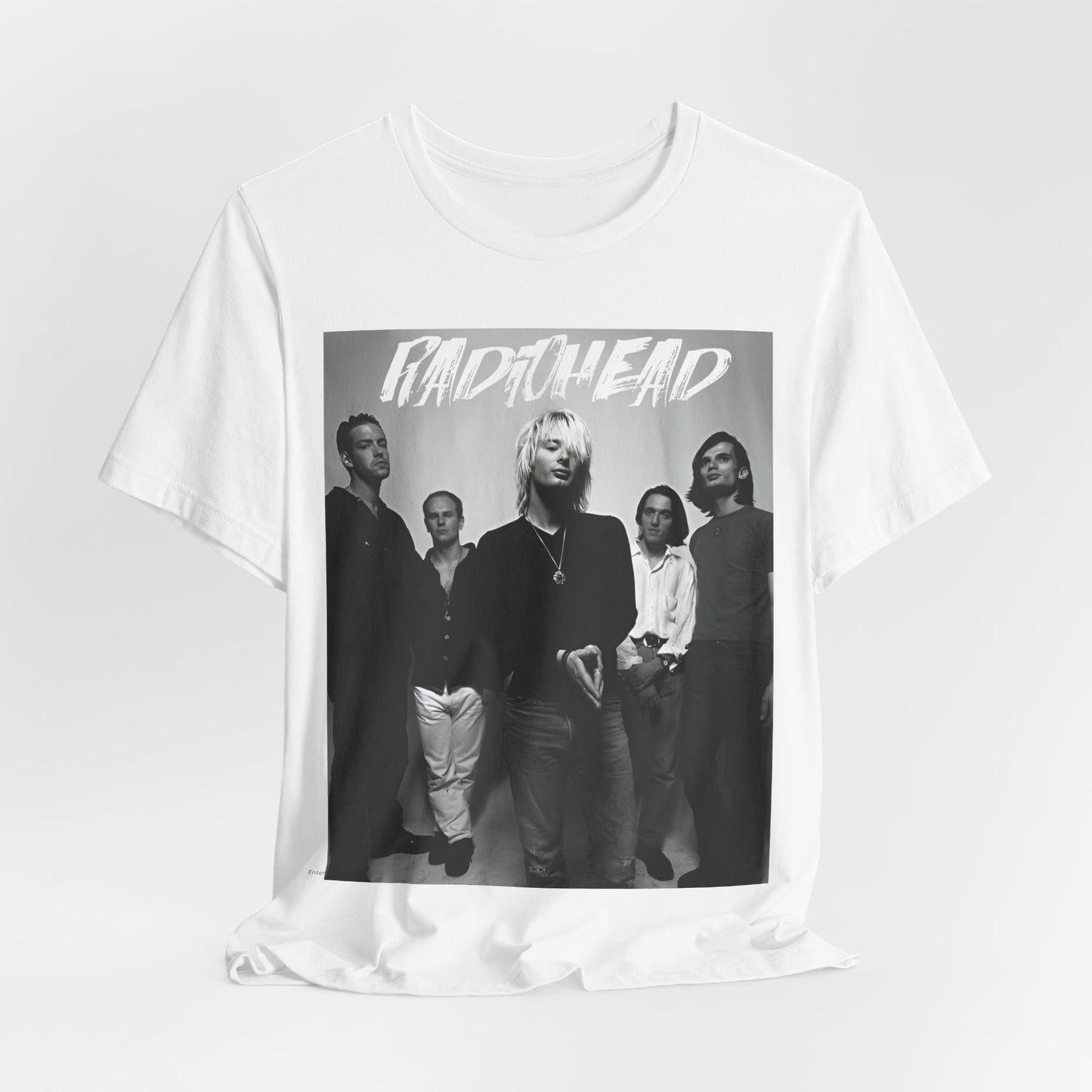 A black graphic t-shirt featuring a retro graphic related to Radiohead's 'OK Computer' album era.