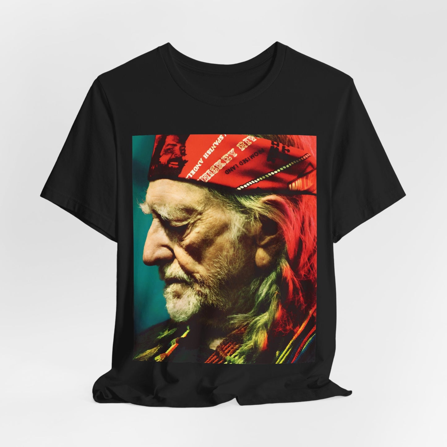 A black graphic t-shirt featuring a graphic related to Willie Nelson's 'Red Headed Stranger' album era.