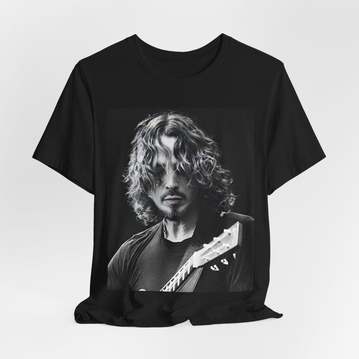 A black graphic t-shirt featuring a graphic of Chris Cornell performing live on tour in the 1990s.