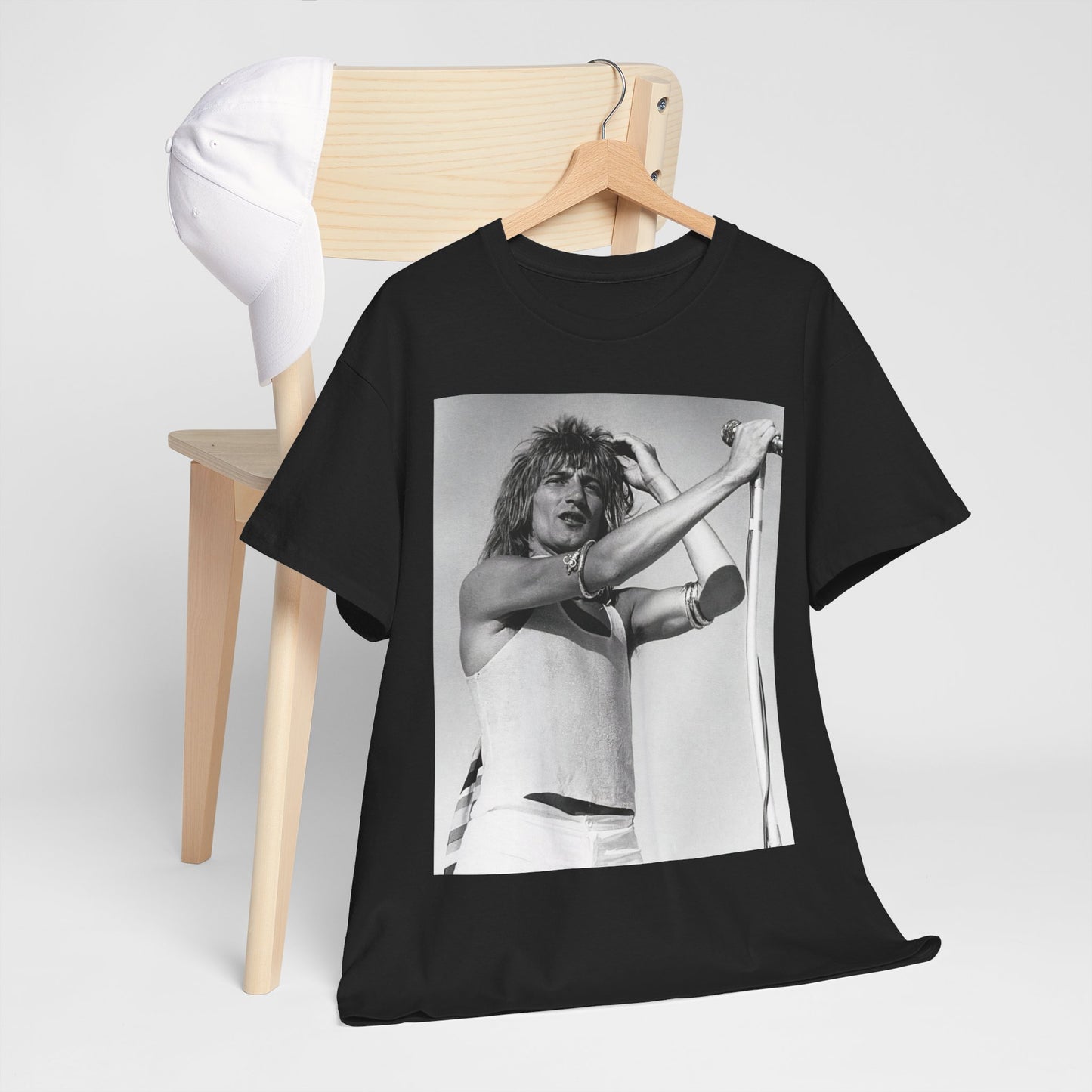 A black graphic t-shirt featuring a vintage black and white graphic or photo of Rod Stewart on tour.