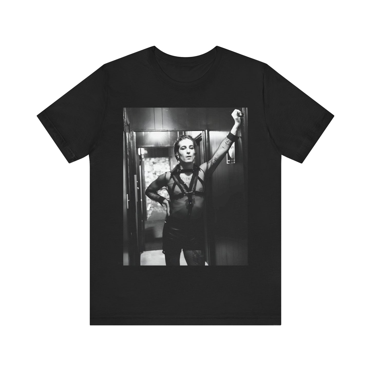 A black graphic t-shirt featuring a graphic of Maneskin emphasizing a rebel rock spirit.