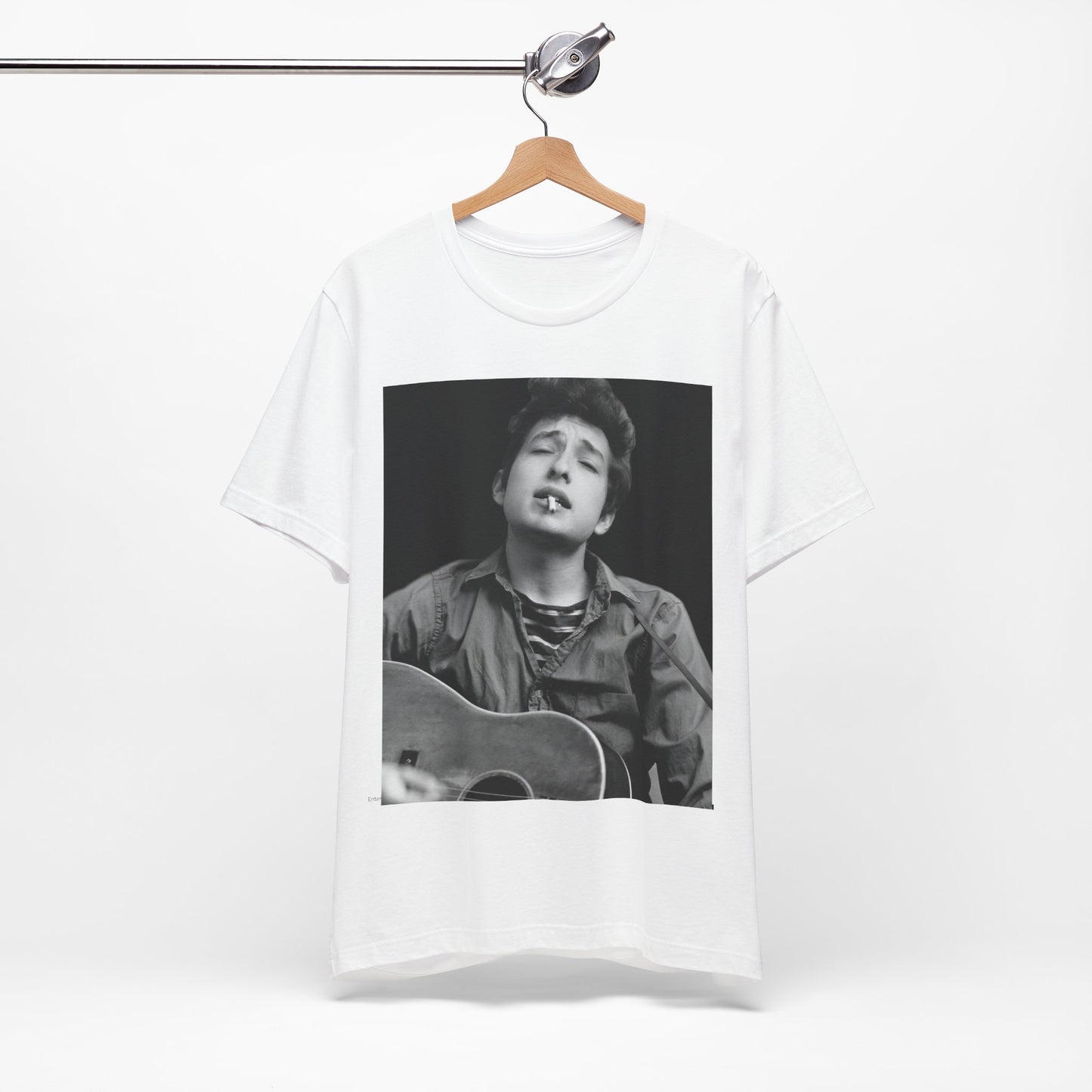 A black graphic t-shirt featuring a photo of Bob Dylan with his acoustic guitar.