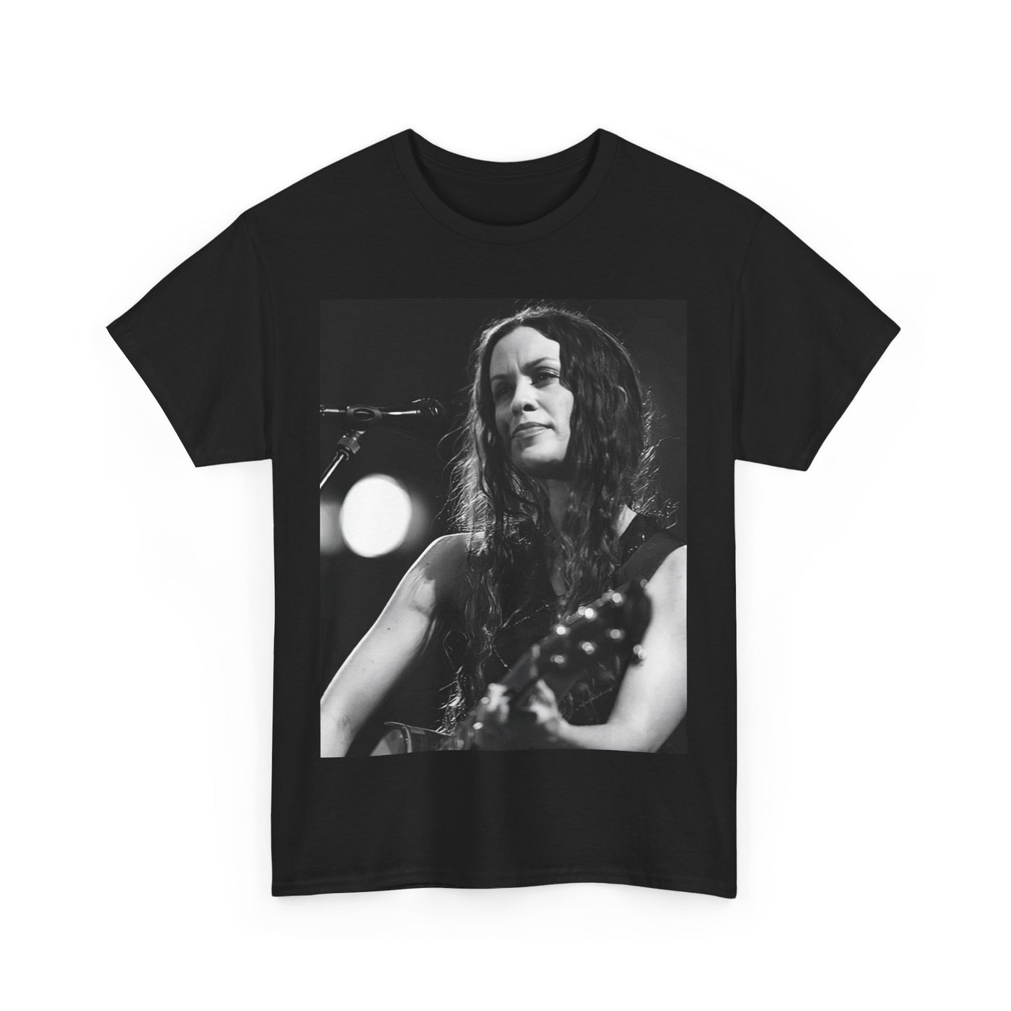 A black graphic t-shirt featuring a 90s-style graphic of Alanis Morissette playing a guitar, with a dynamic expression.