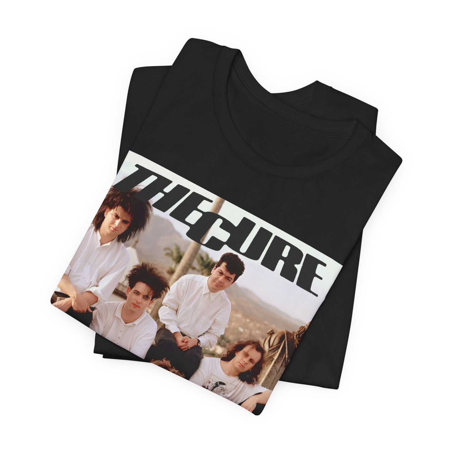 A black graphic t-shirt featuring a vintage graphic of The Cure with a dark romanticism theme.