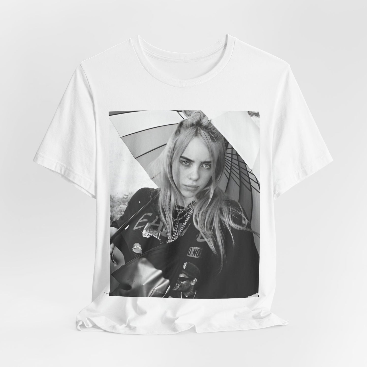 A graphic t-shirt inspired by the colorful and iconic music video for "Bad Guy" by Billie Eilish.