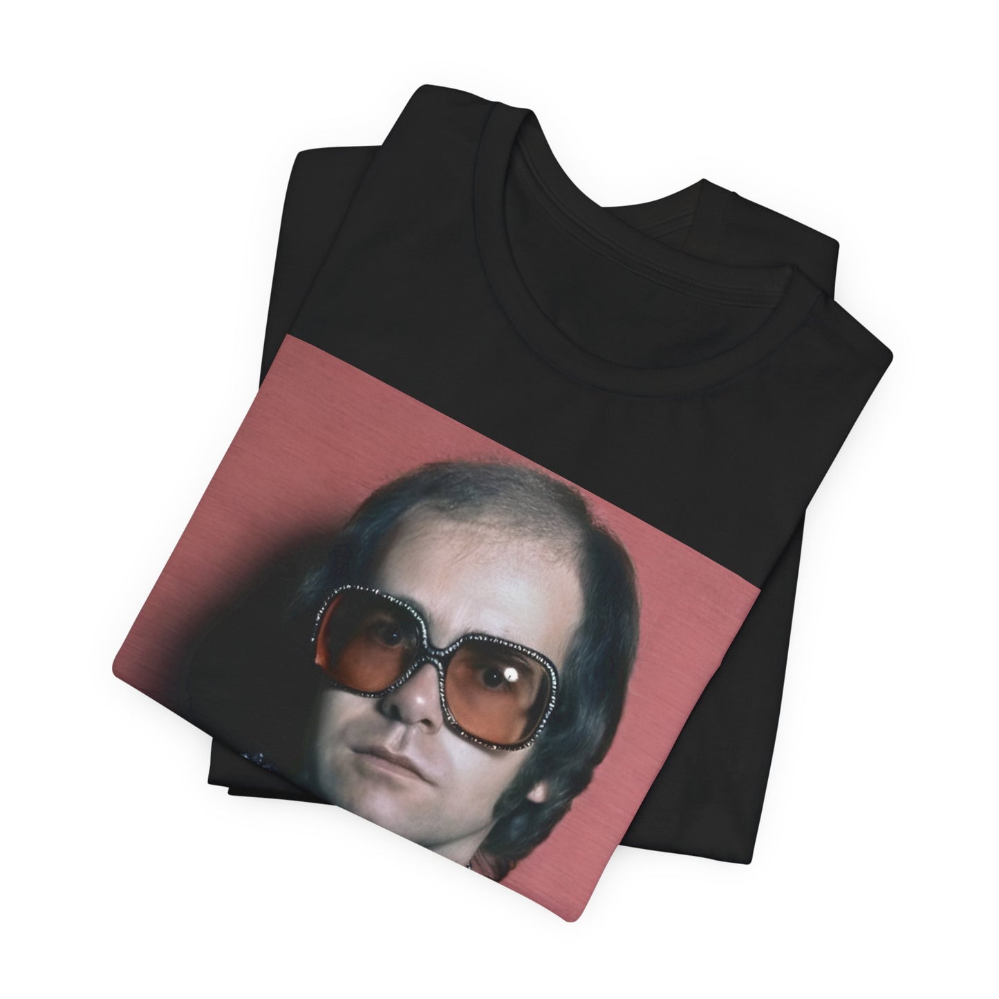 A black graphic t-shirt featuring a vintage glam rock icon graphic of Elton John.