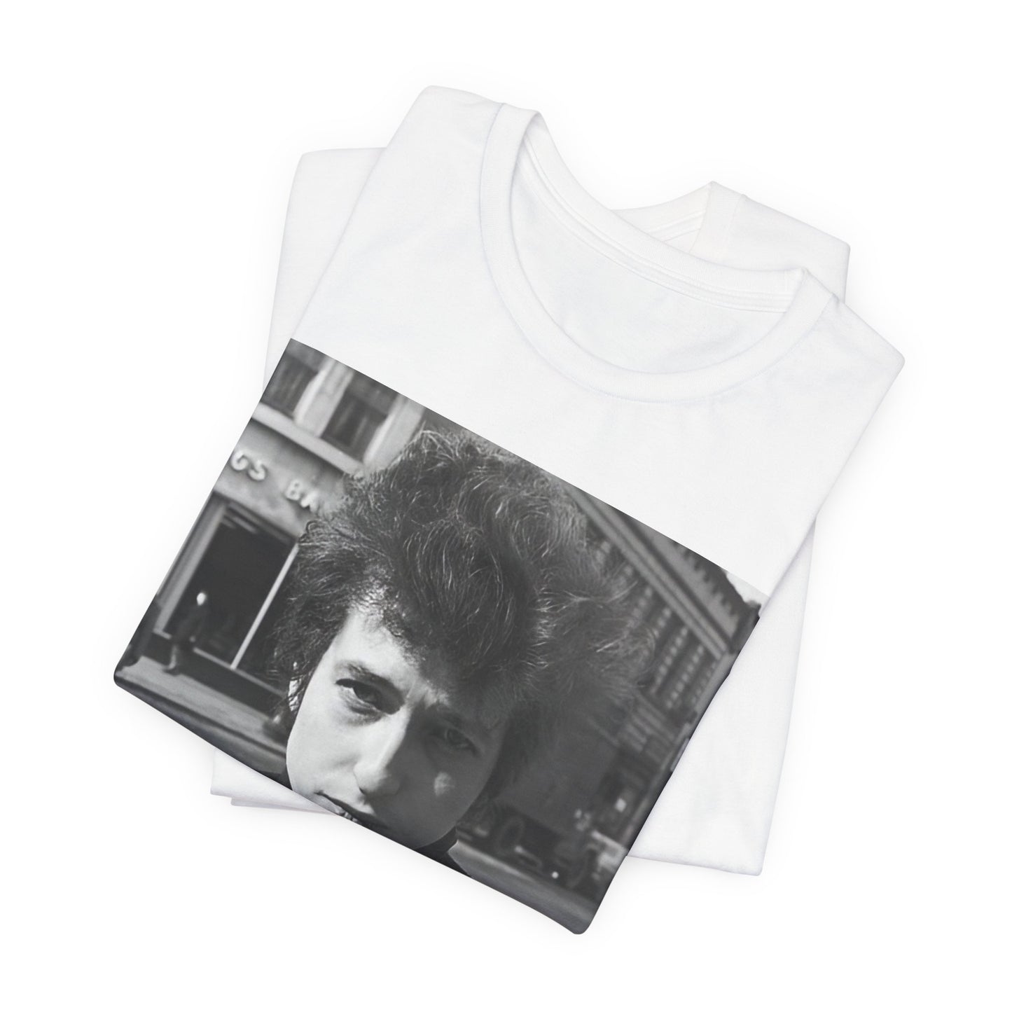 A black graphic t-shirt featuring a 60s black and white photo portrait of Bob Dylan.