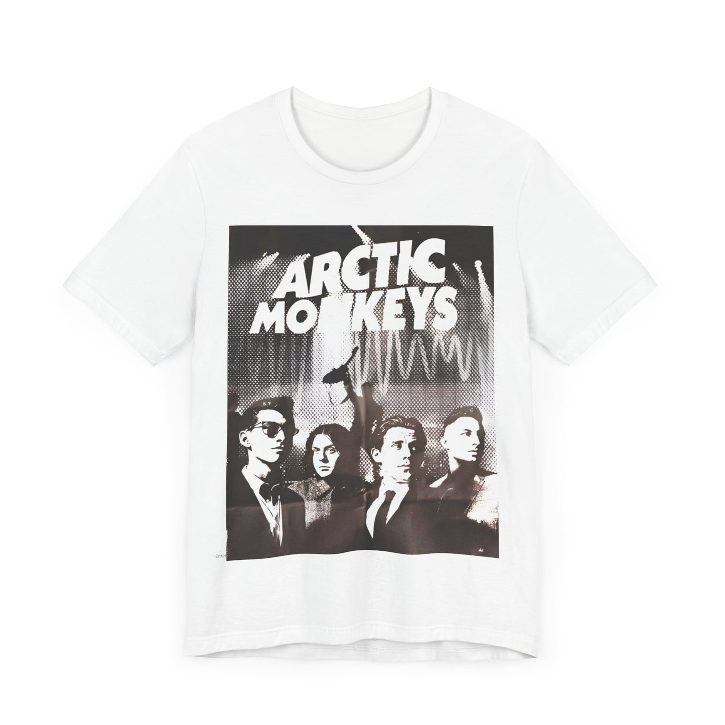 A black graphic t-shirt featuring a retro-style logo for the band Arctic Monkeys.