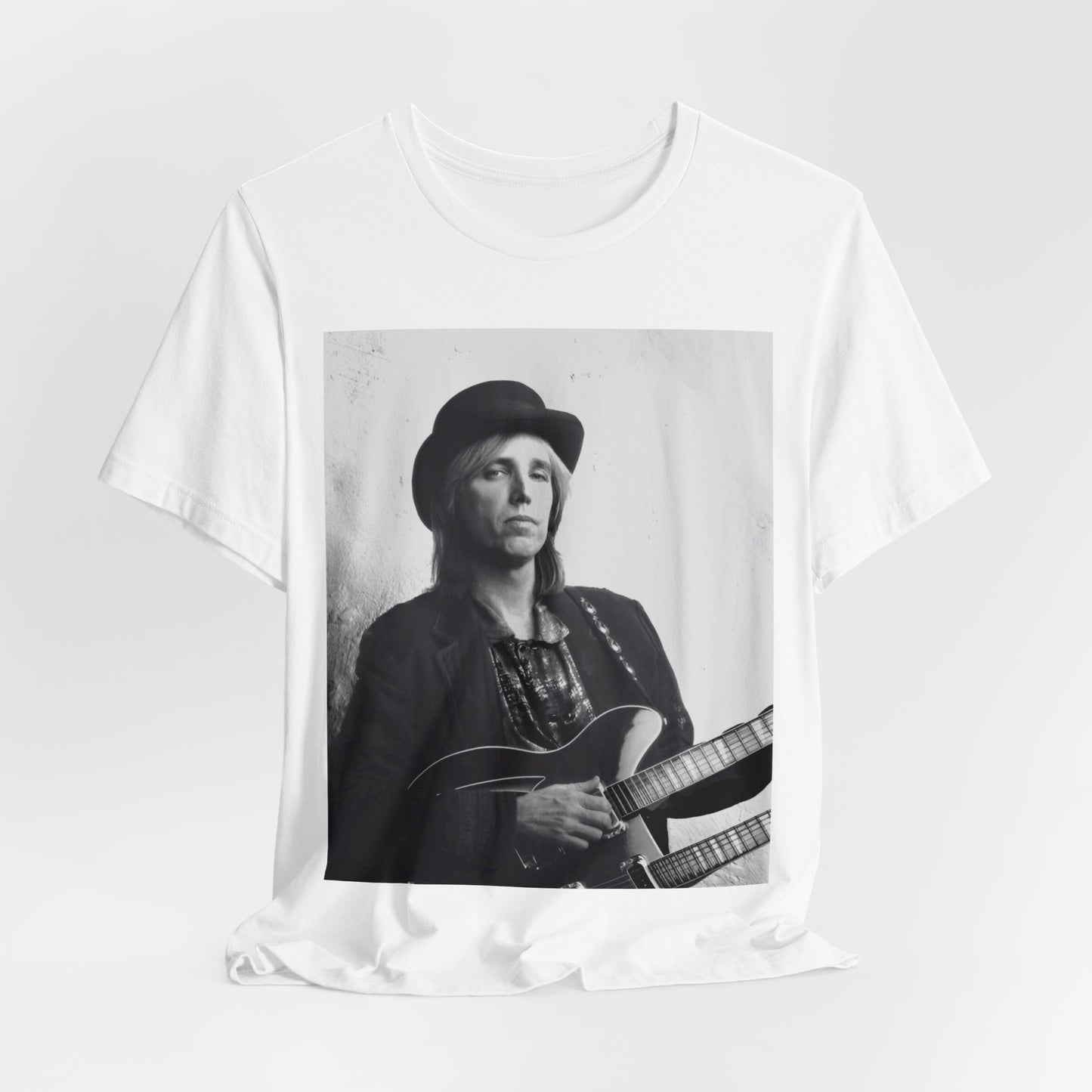 A black graphic t-shirt featuring a graphic related to Tom Petty's 'Wildflowers' album era.