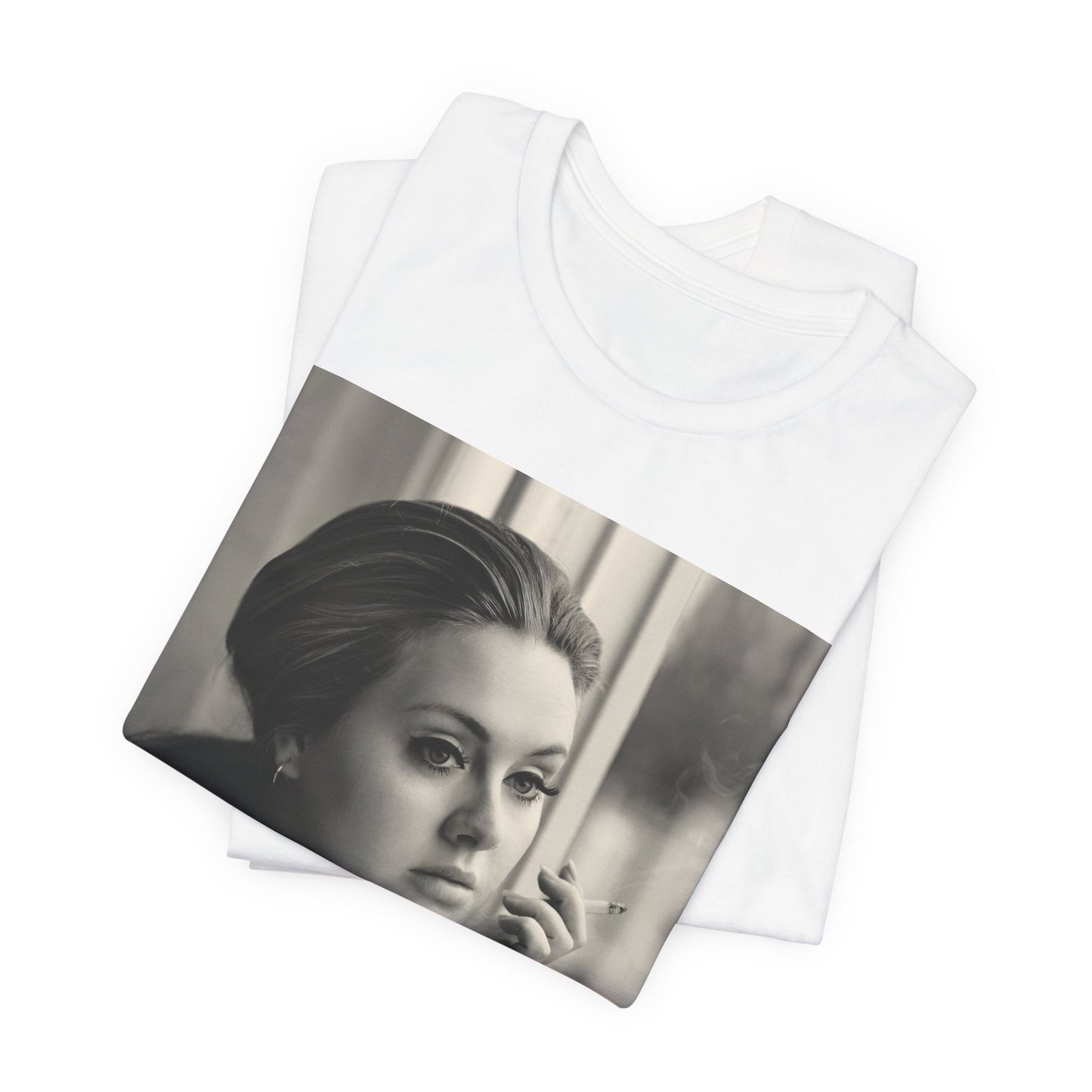 A black graphic t-shirt featuring a black and white photo of Adele, showing her with a serene or thoughtful expression.
