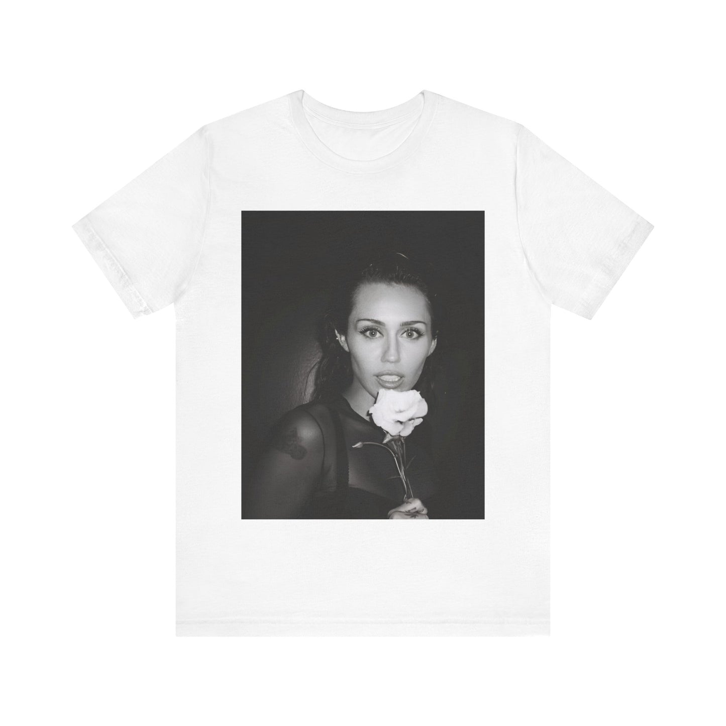 A black graphic t-shirt featuring a graphic related to Miley Cyrus' 'Flowers' song or era.