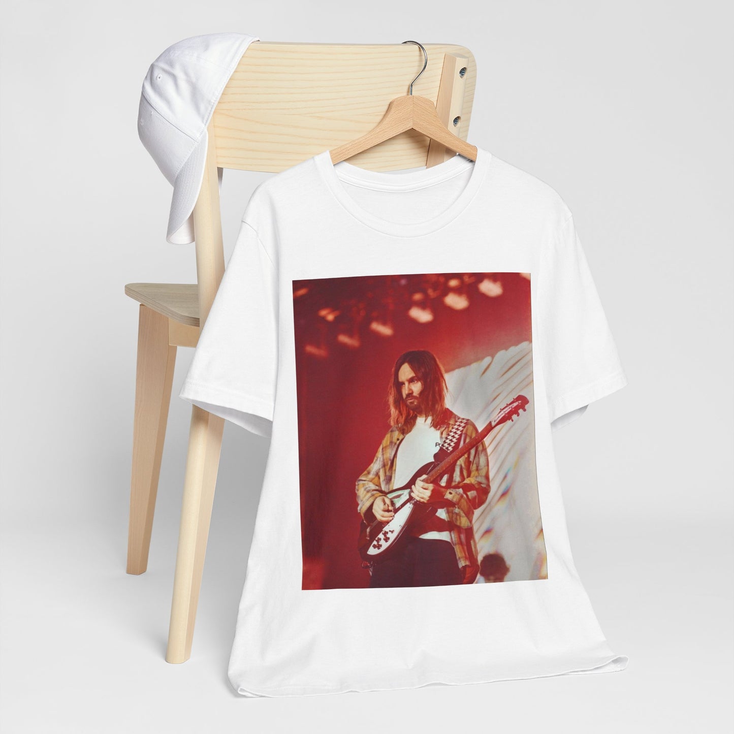 A black graphic t-shirt featuring a cool psychedelic journey graphic of Tame Impala.