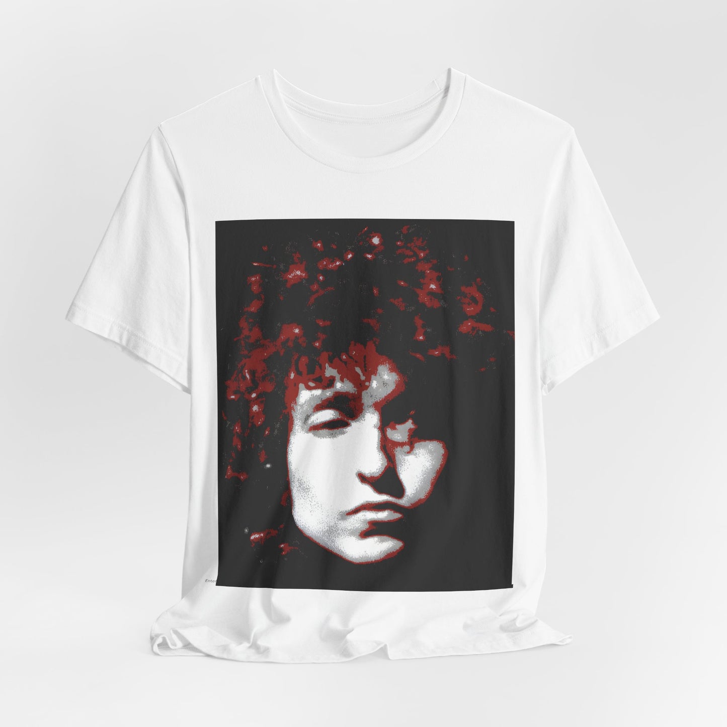 A black graphic t-shirt featuring a graphic related to Bob Dylan's 'Blood on the Tracks' album era, possibly with album art elements.