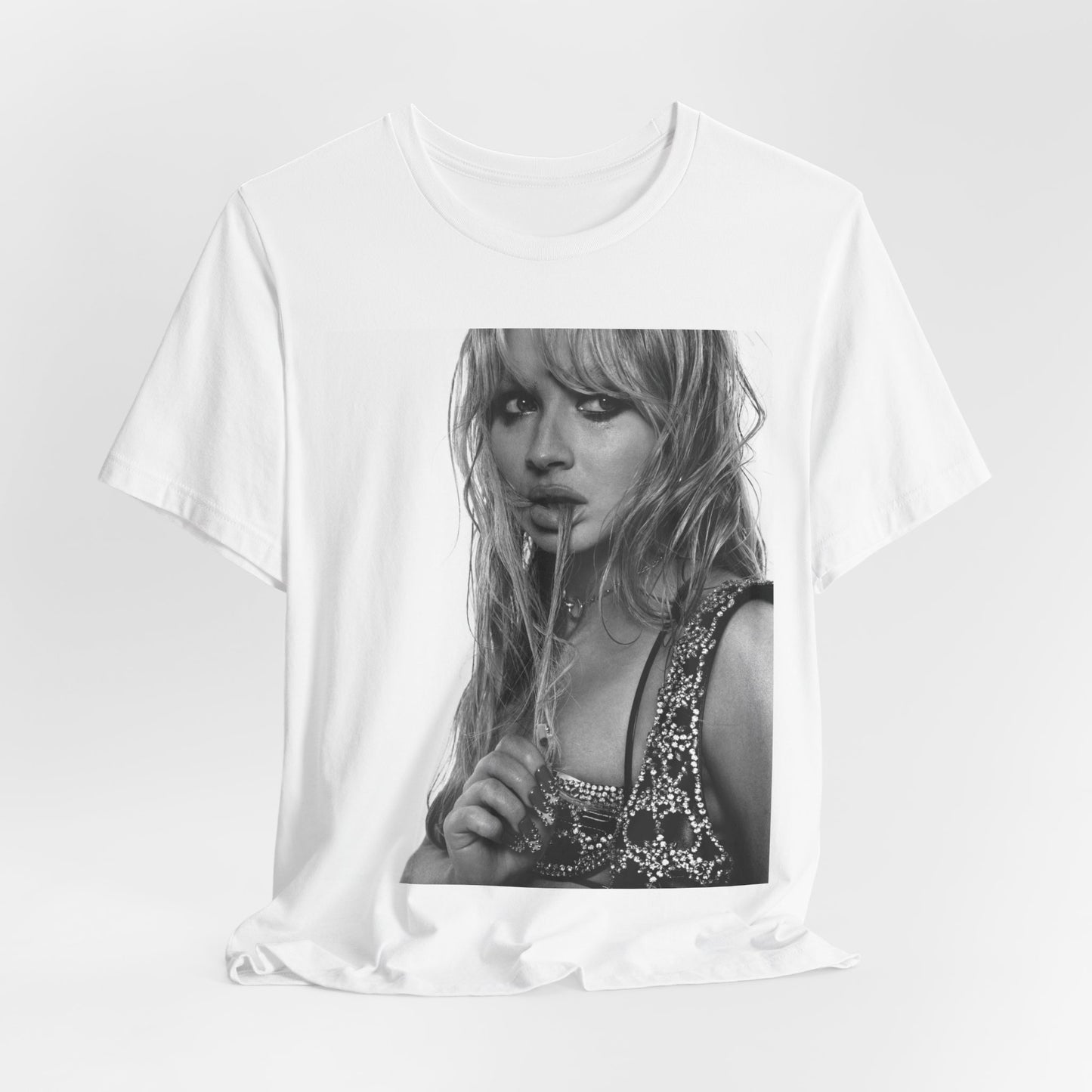 A black graphic t-shirt featuring a black and white portrait photo of Sabrina Carpenter.