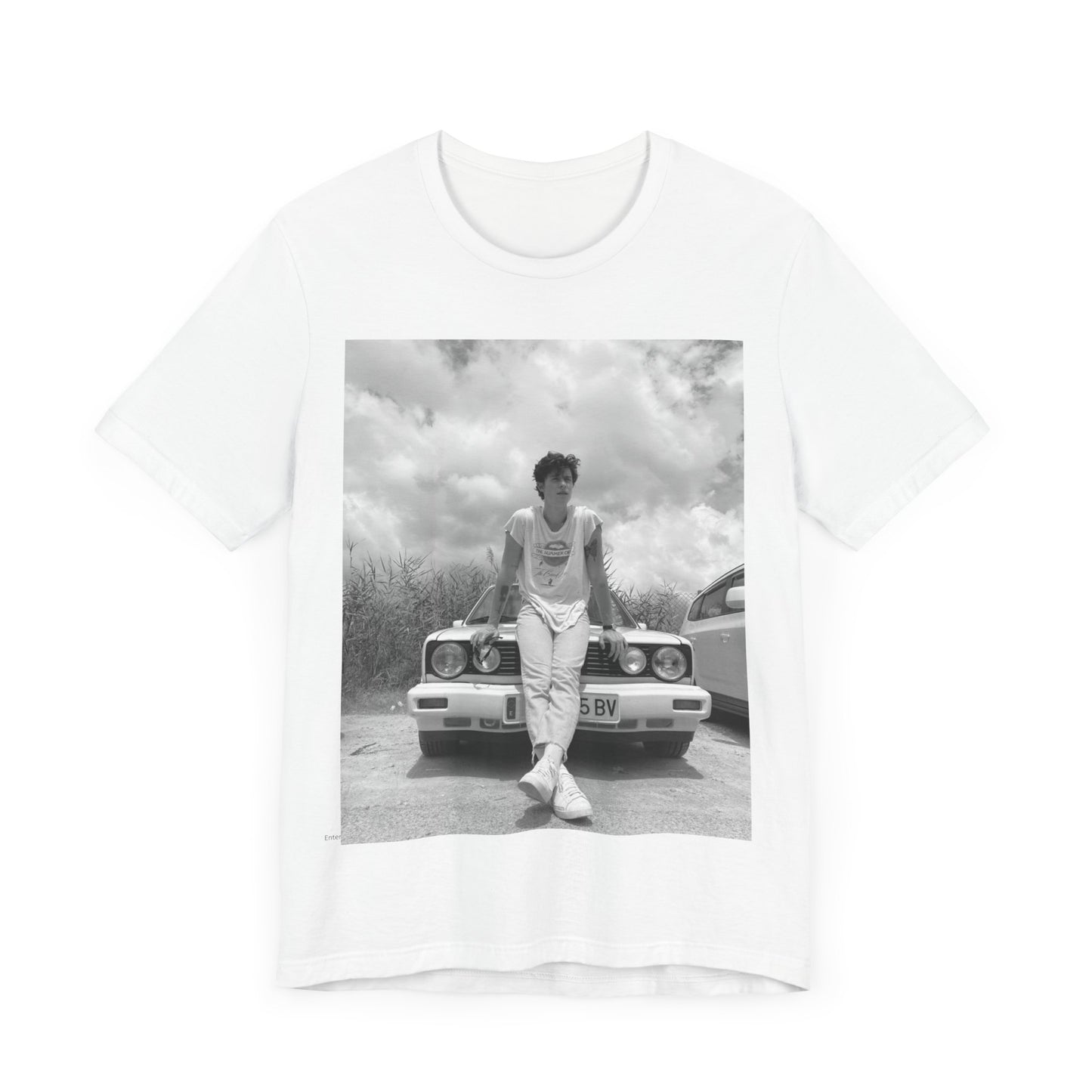 A black graphic t-shirt featuring a graphic of Shawn Mendes in an iconic tank top look.