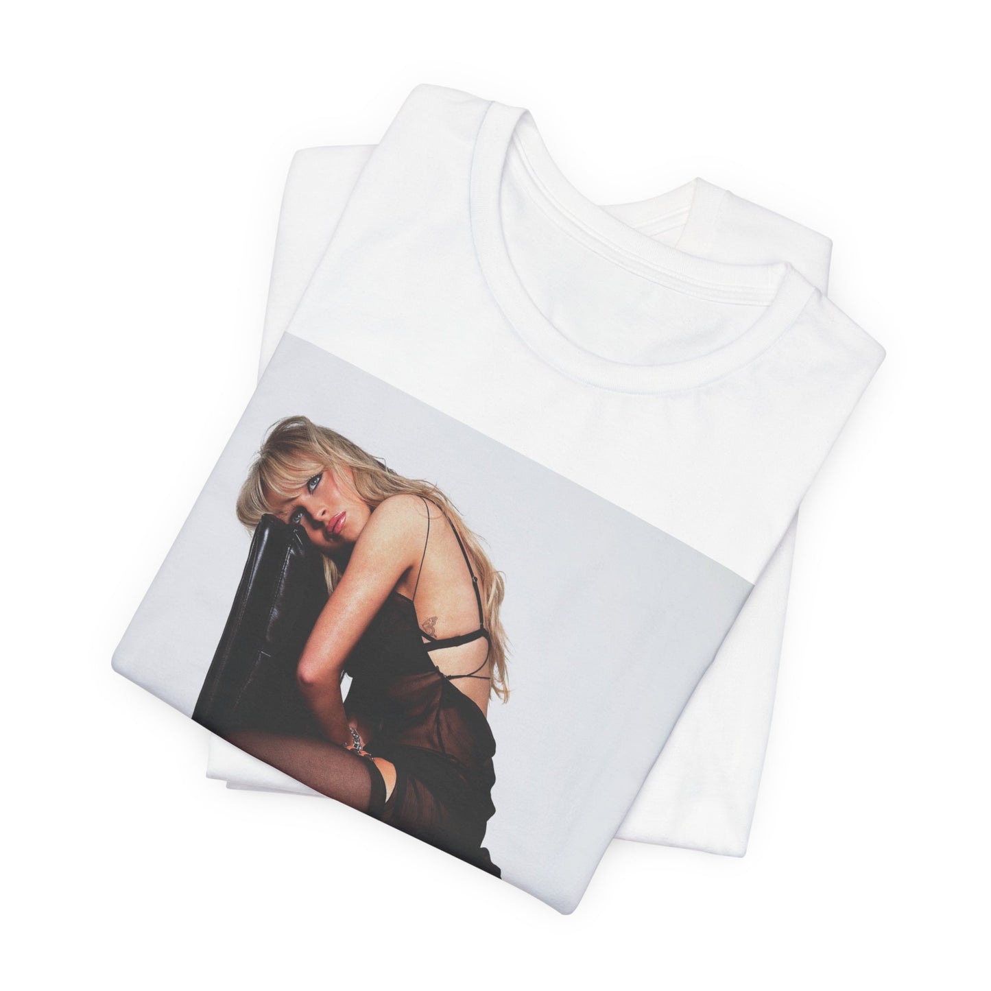A black graphic t-shirt featuring a playful pop art style graphic of Sabrina Carpenter.