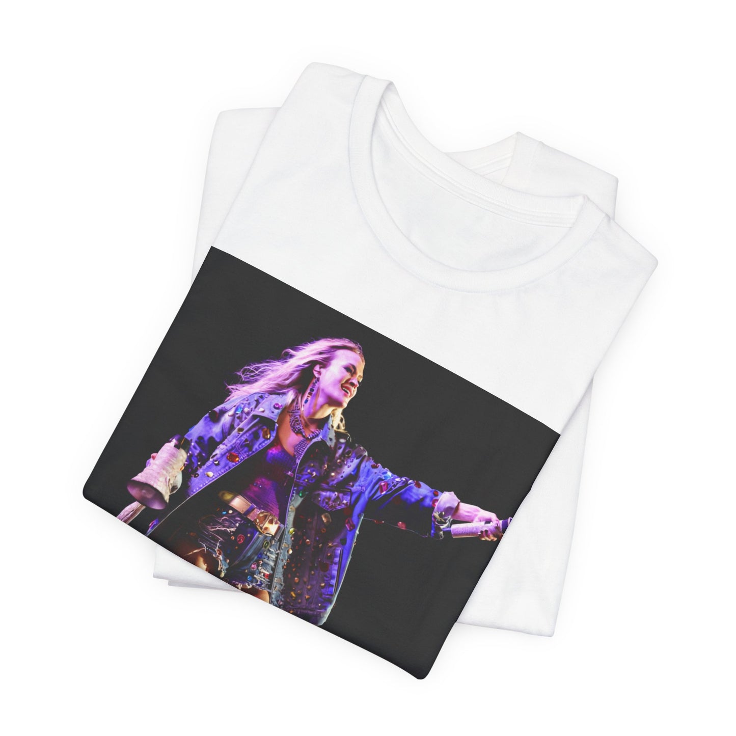 A black graphic t-shirt featuring a graphic of Carrie Underwood with Nashville-themed elements or skyline.