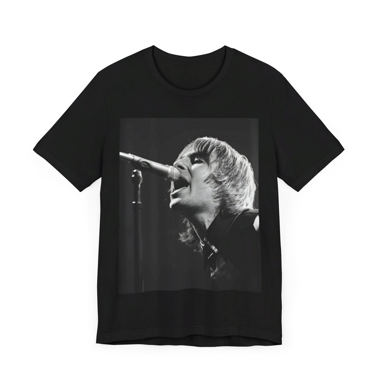 A black graphic t-shirt featuring a black and white graphic or photo of Liam Gallagher from Oasis performing live on stage.