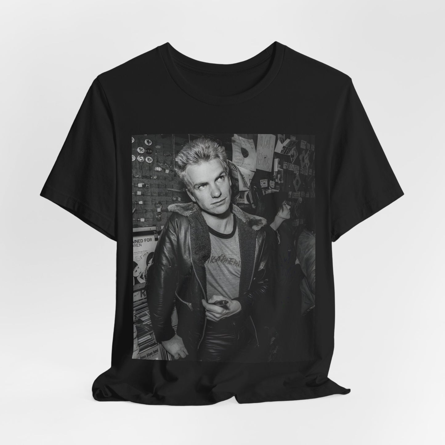 A black graphic t-shirt featuring a vintage black and white monochrome graphic or photo of Sting.