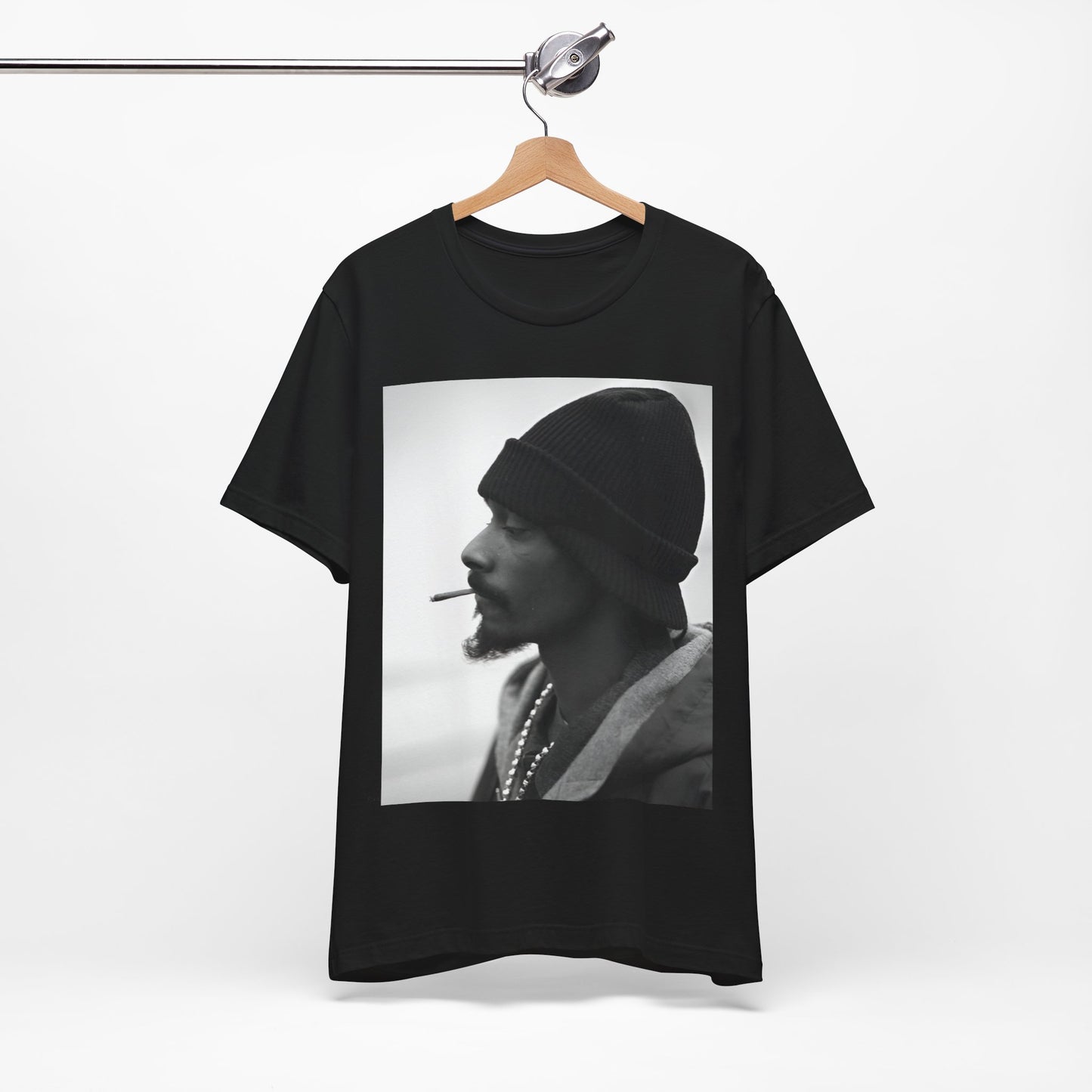 A black graphic t-shirt featuring a graphic of Snoop Dogg designed for everyday West Coast style.