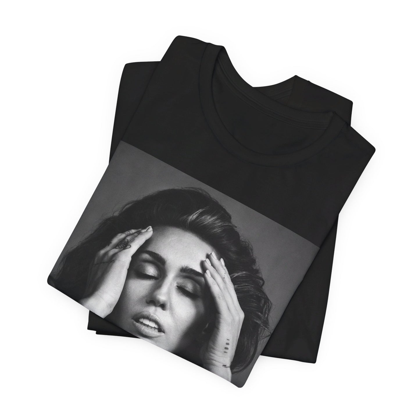 A black graphic t-shirt featuring a retro graphic related to Miley Cyrus' 'Bangerz' album era.
