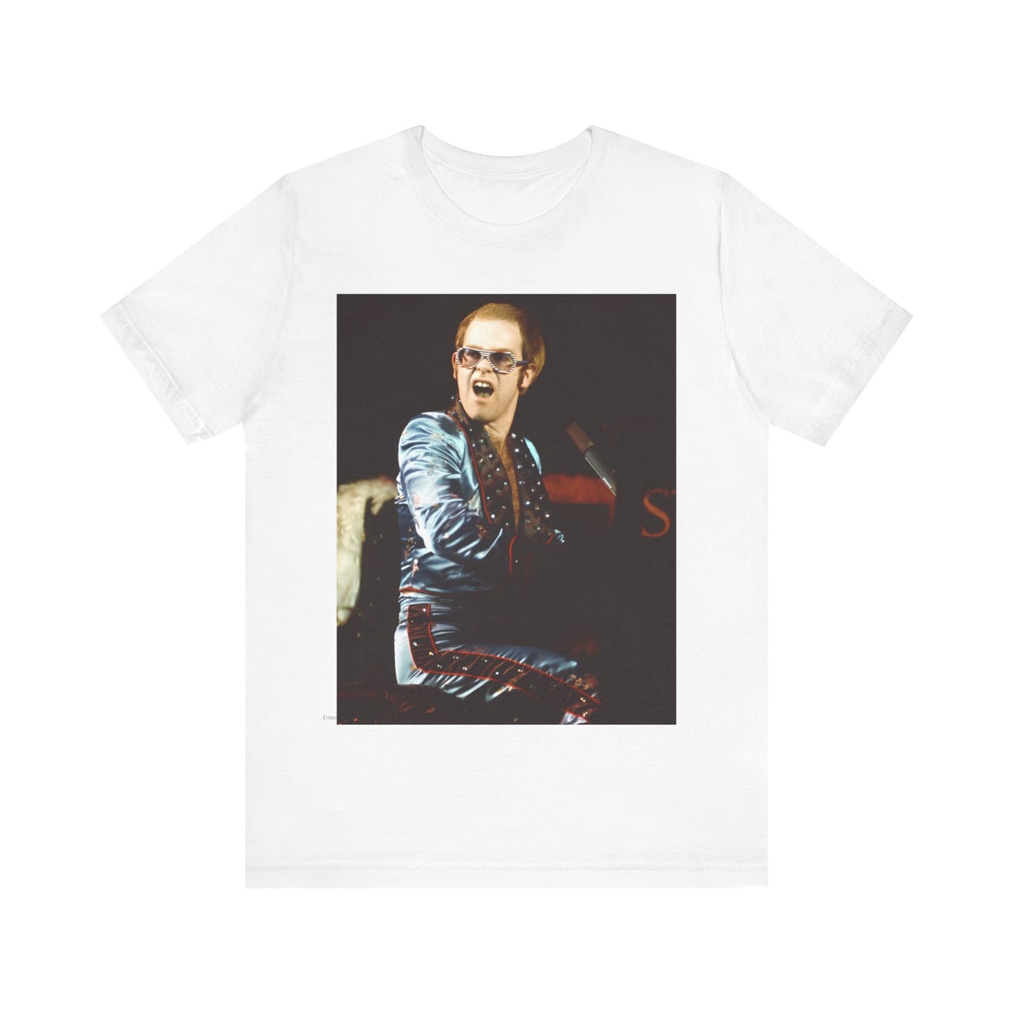 A black graphic t-shirt featuring a retro graphic related to Elton John's 'Rocket Man' song or era.