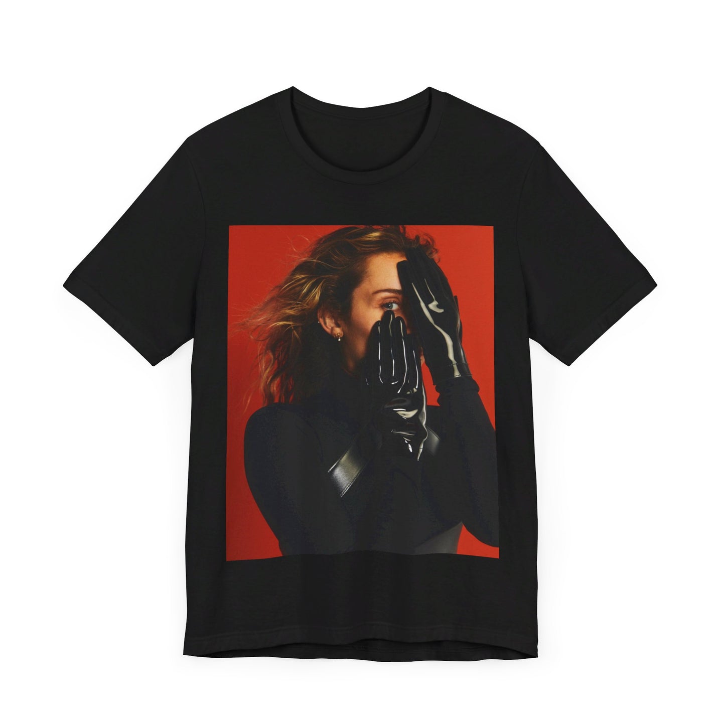 A black graphic t-shirt featuring a graphic of Miley Cyrus with Nashville or country music elements.