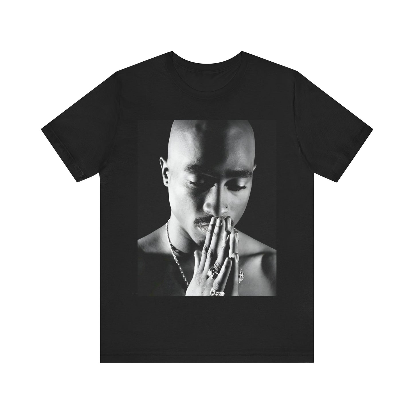 A black graphic t-shirt featuring a black and white streetwear rebel graphic of Tupac.