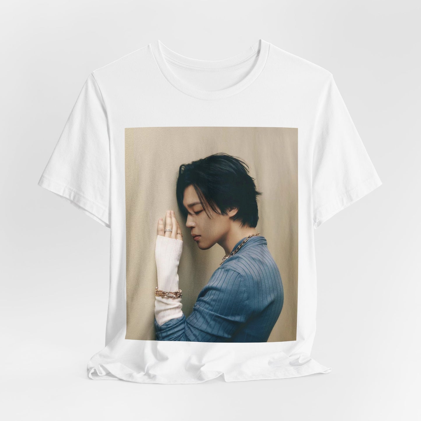 A black graphic t-shirt featuring a cool K-Pop idol essential graphic of Jimin.