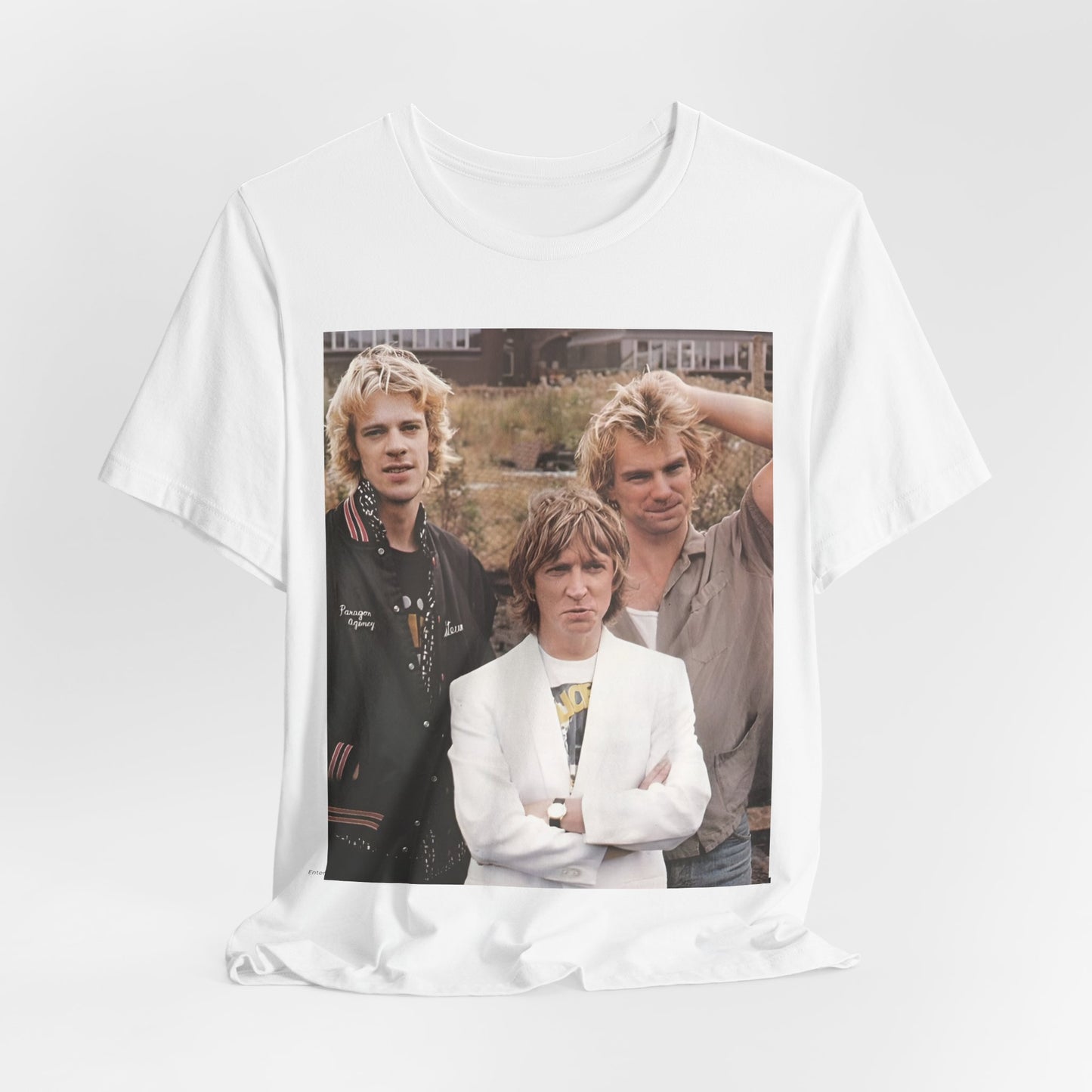 A black graphic t-shirt featuring a graphic of The Police as a timeless three-piece band.
