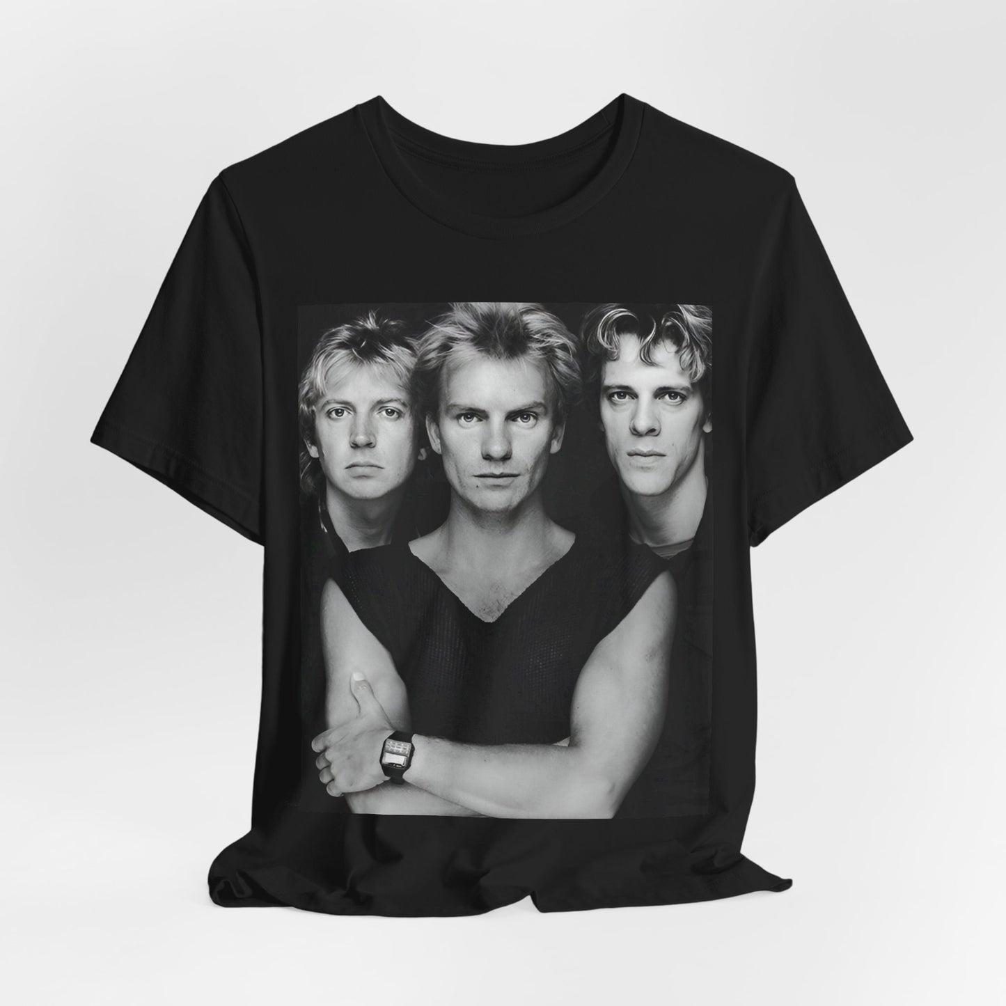 A black graphic t-shirt featuring a graphic related to The Police's 'Every Breath You Take' song or era.