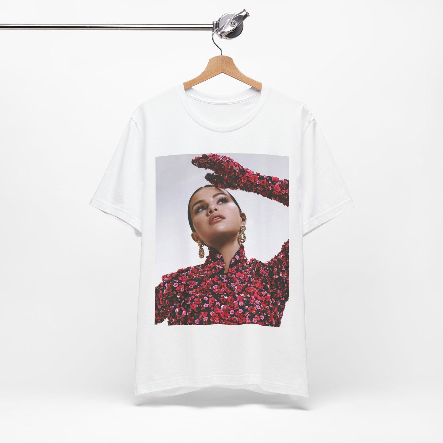 A black graphic t-shirt featuring a classic aesthetic graphic of Selena Gomez.