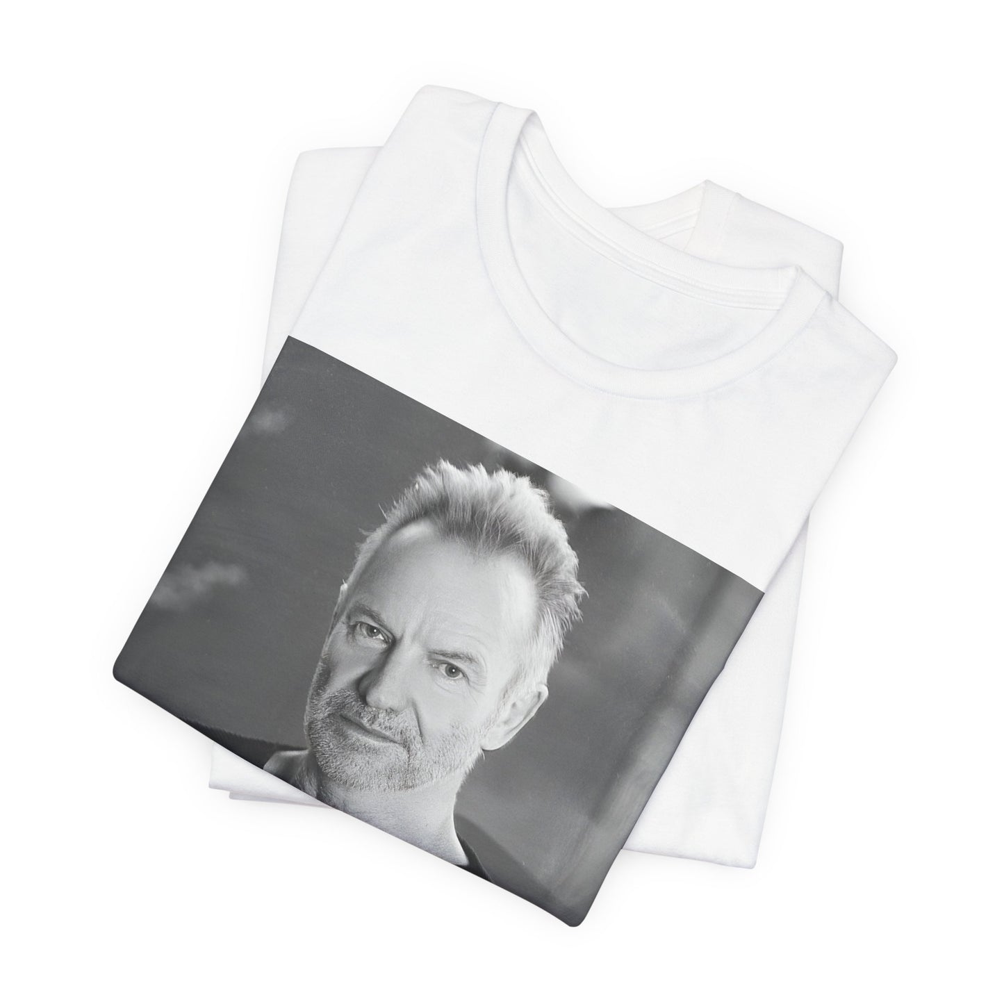 A black graphic t-shirt featuring a vintage graphic related to Sting's 'Desert Rose' song or era.