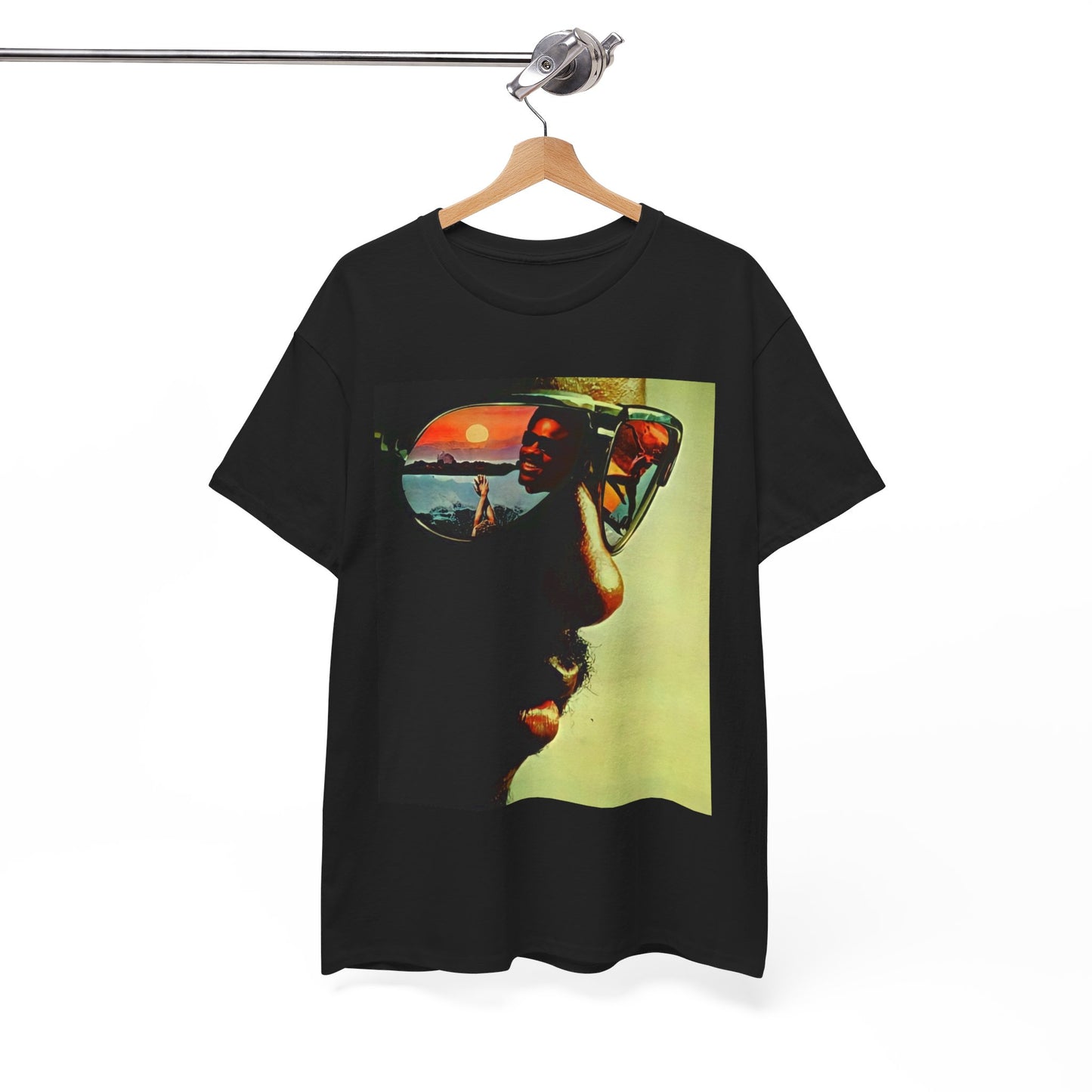 A black graphic t-shirt featuring a 70s aesthetic graphic of Stevie Wonder.